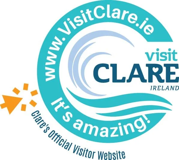 Circular logo promoting visitclare.ie, featuring a stylized wave and the text 'Visit Clare Ireland, it's amazing!'.