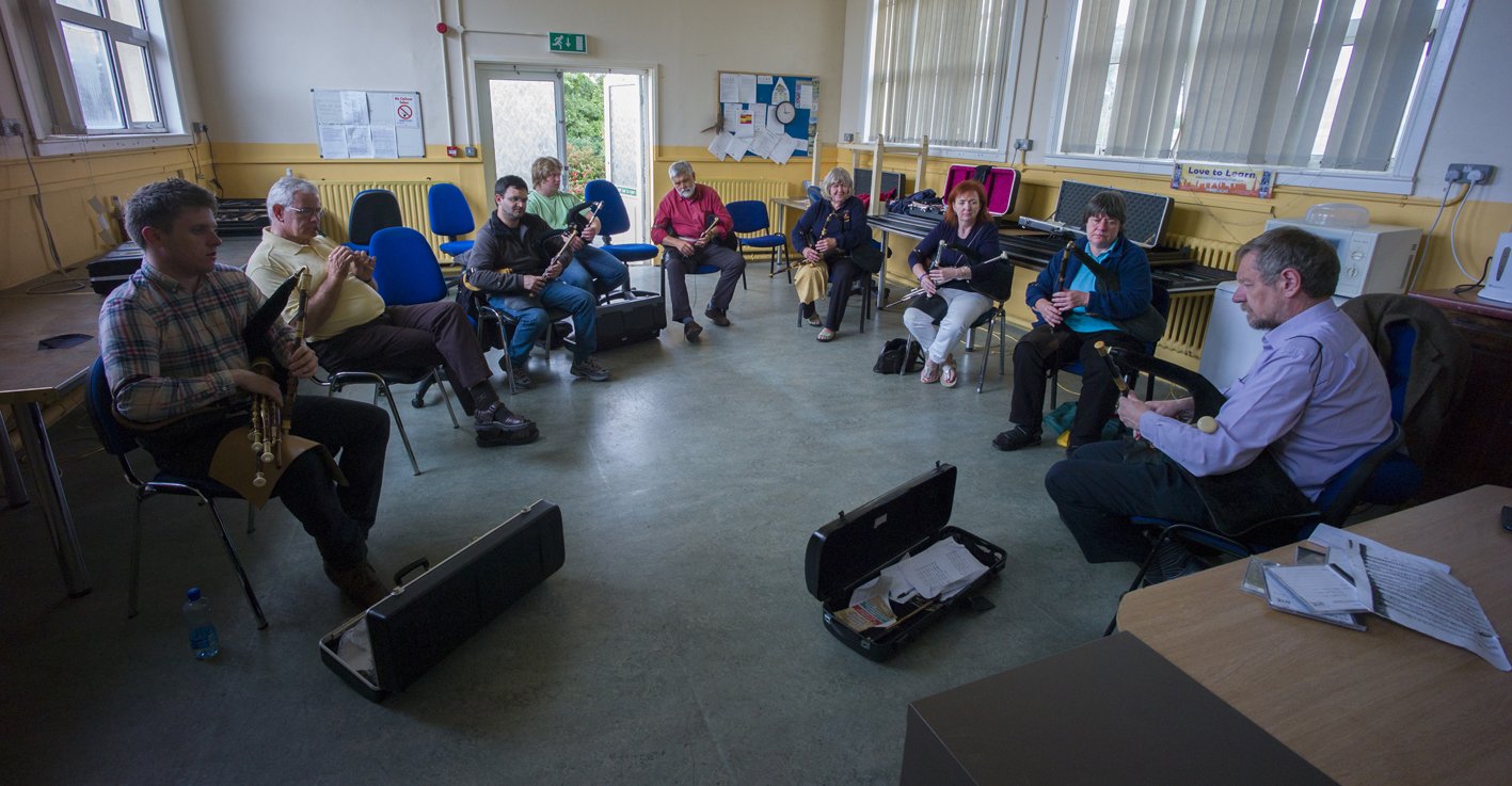 Peter Browne (right) with his slow air piping class 2015.