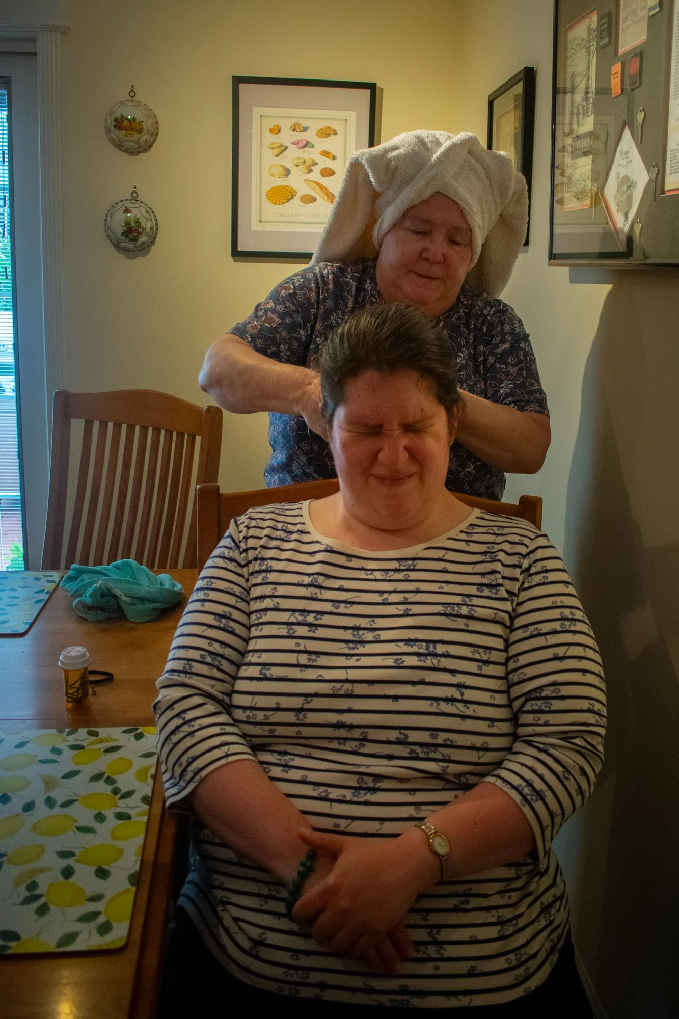 Marge combs Andrea’s hair before work on Monday, June 2.
Marge said she and Leo are proud of Andrea’s independence. They can now leave her home alone for errands, and she’s able to go to the store by herself. Their next goal is to take an overnight