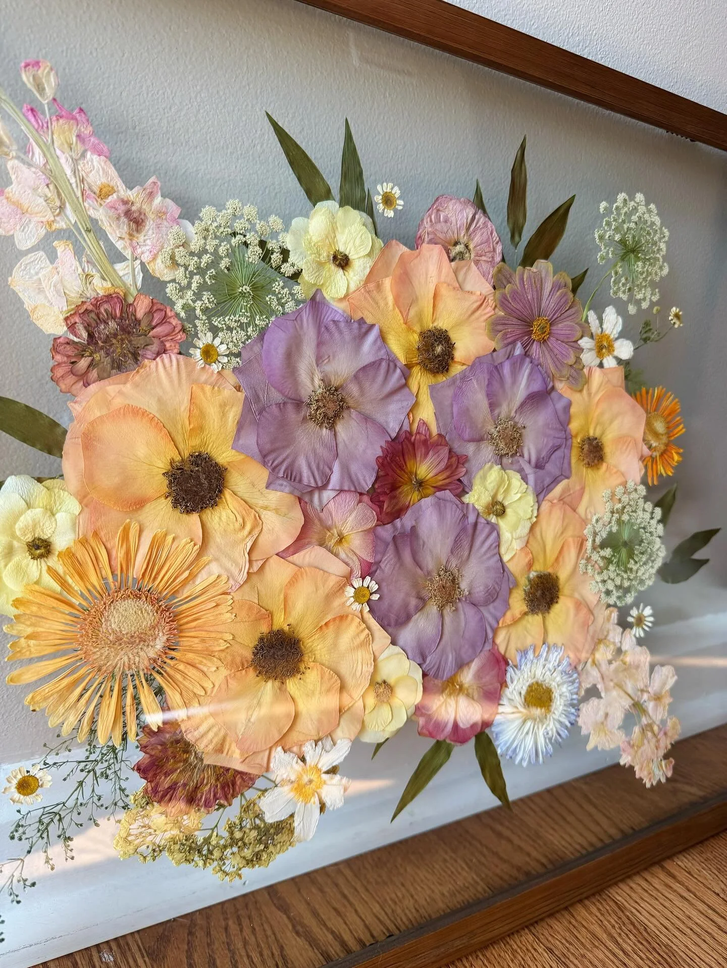 the happiest summertime bridal bouquet✨🤍 the colors, the textures- obsessed is an understatement.

#marigoldandmoon #marylandbride #floralpreservation #flowerpreservation #flowerpressing