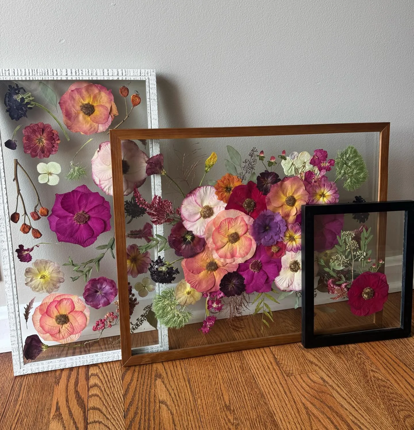 obsessed with this gorgeous bridal package 💕✨ we love when clients request unique floral designs! 

The large frame is her bridal bouquet, the whimsical white frame is full of accent florals from her sweetheart table, and the smallest is her husband