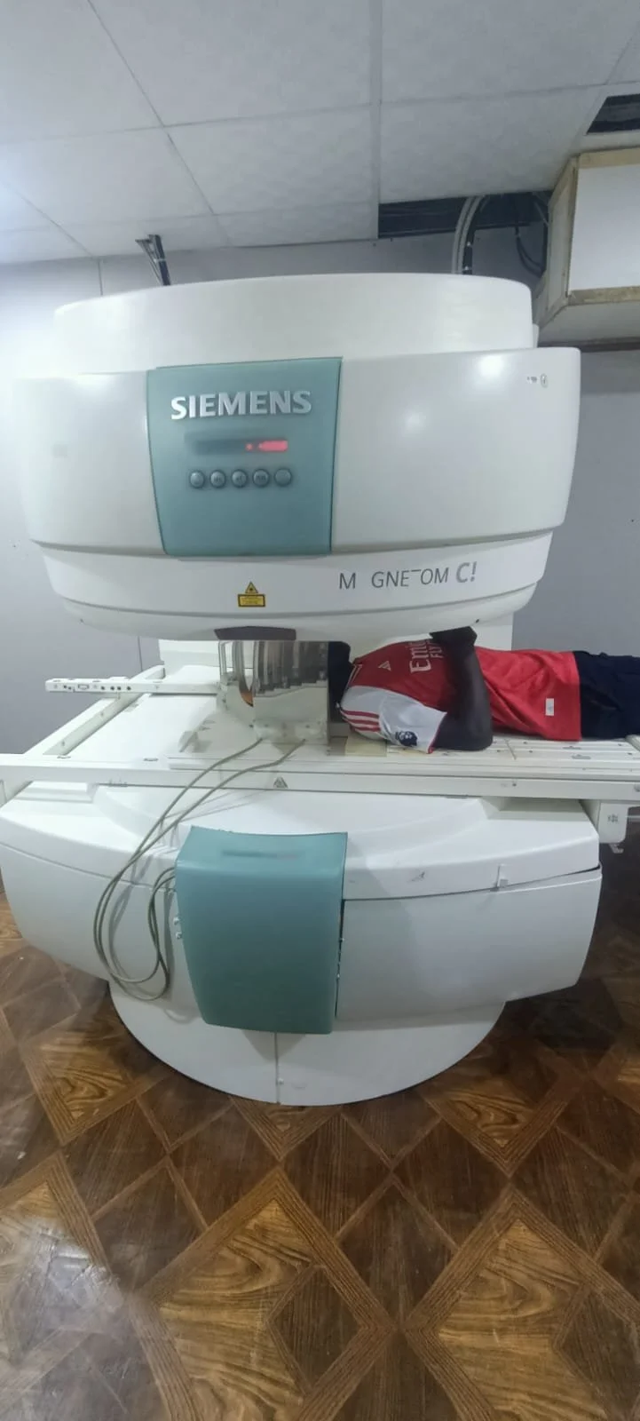 Siemens MAGNETOM C open MRI installed and scanning a patient