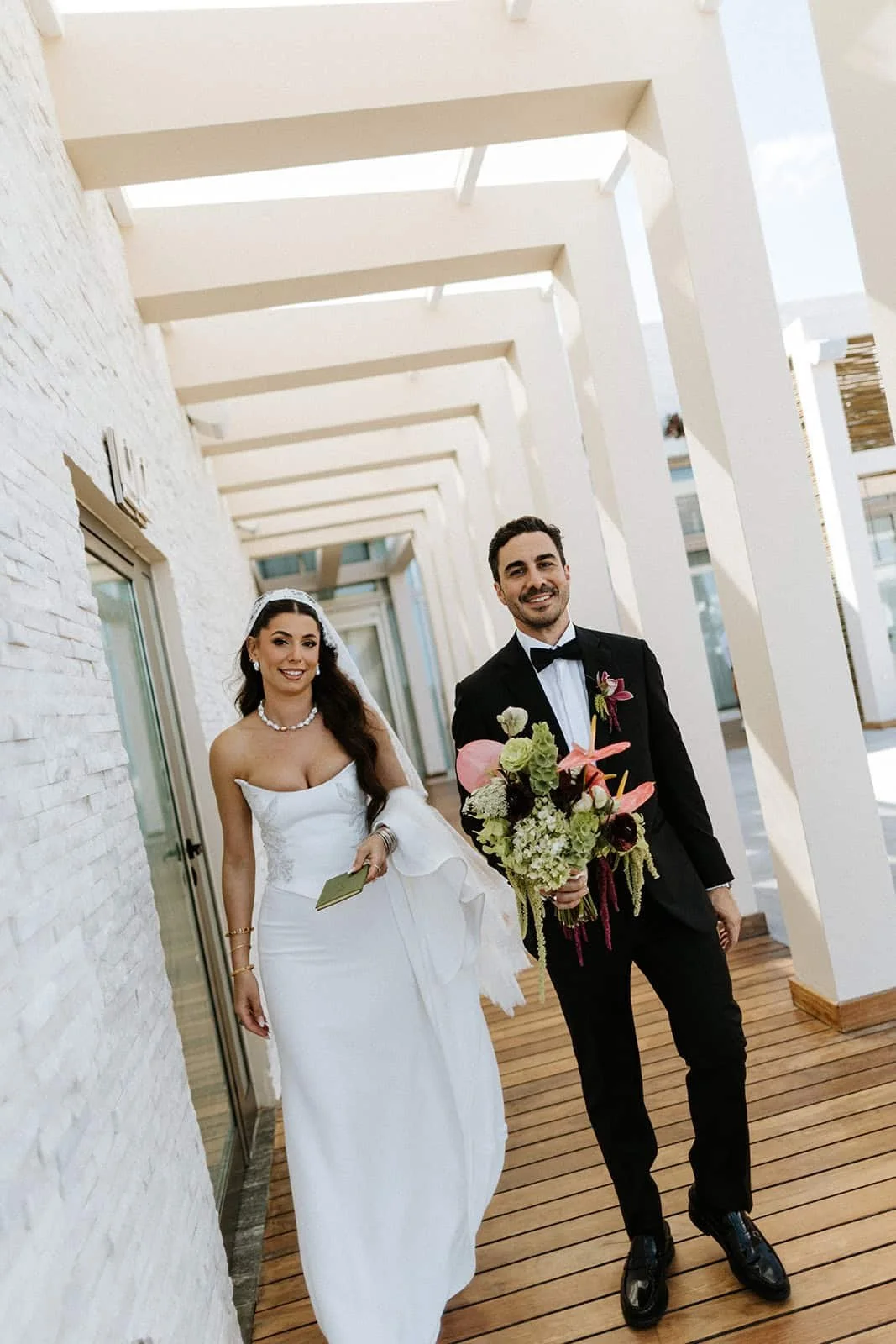 garza-blanca-cancun-wedding-couple-walkway.jpg