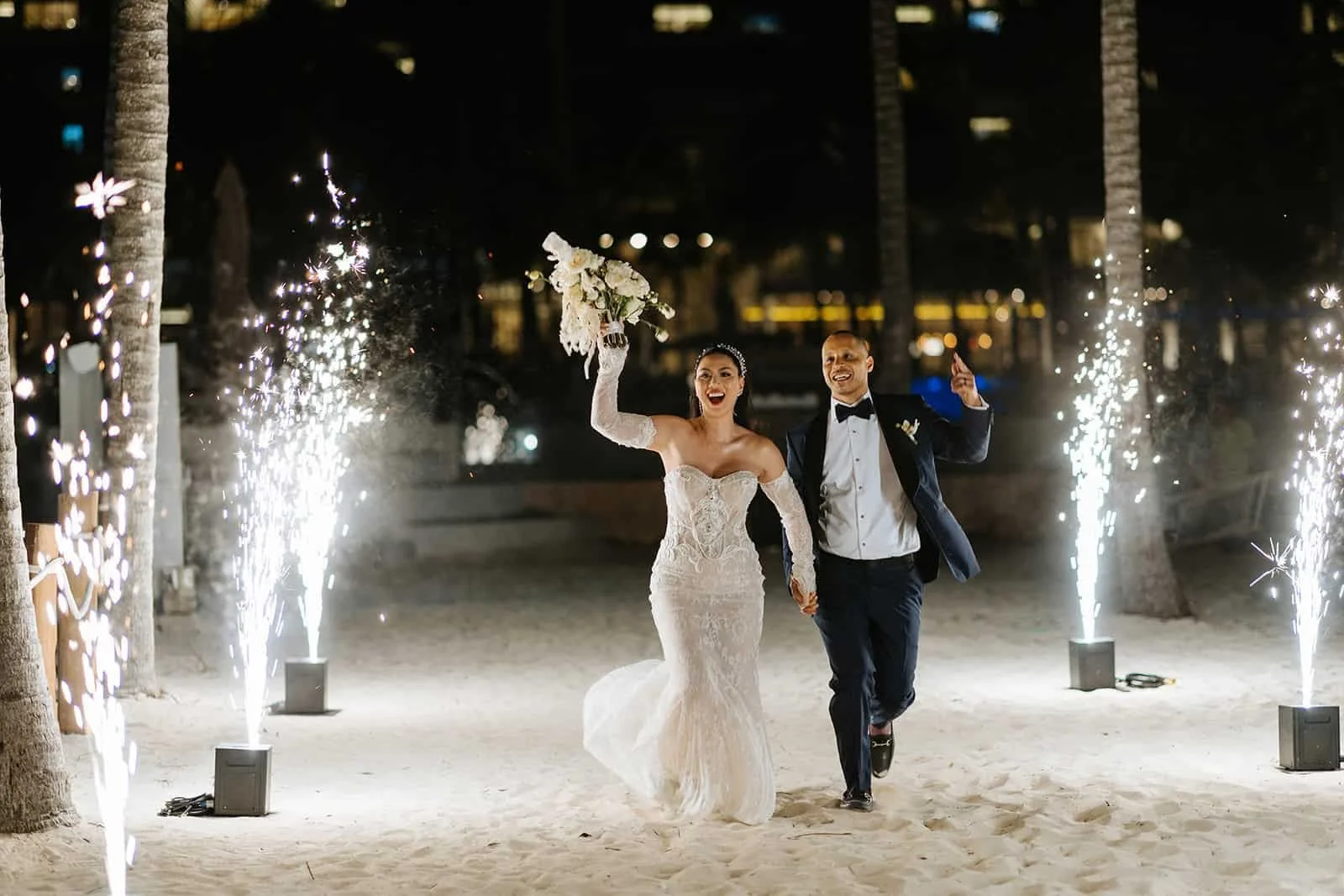 garza-blanca-cancun-wedding-sparkler-exit-beach.jpg