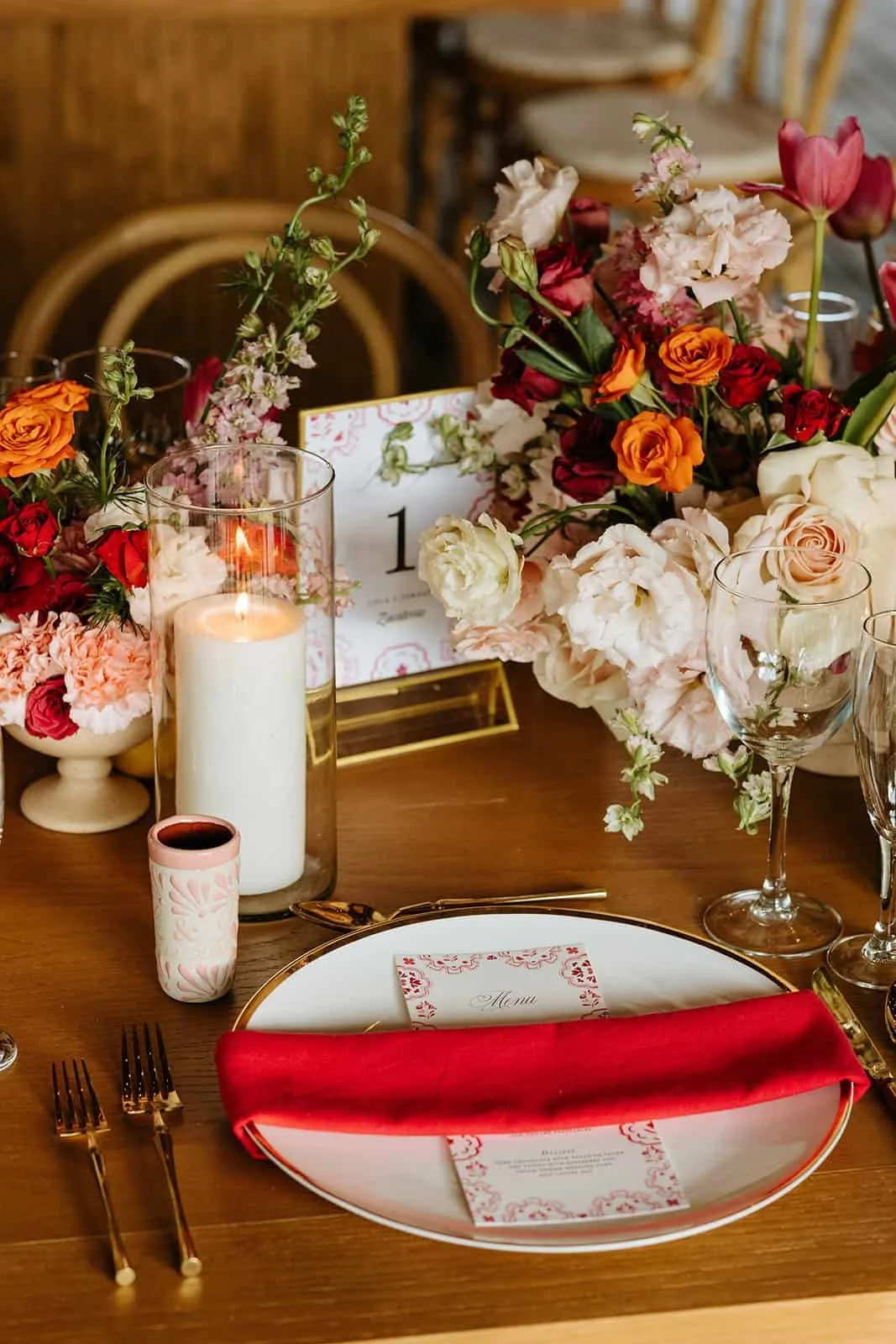 blue-venado-wedding-reception-tablescape-florals-red-blush.jpg