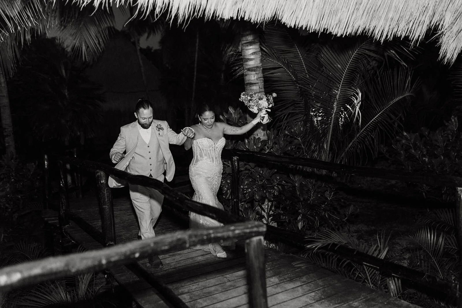 dolores-jordan-night-entrance-blue-venado-wedding-riviera-maya.jpg