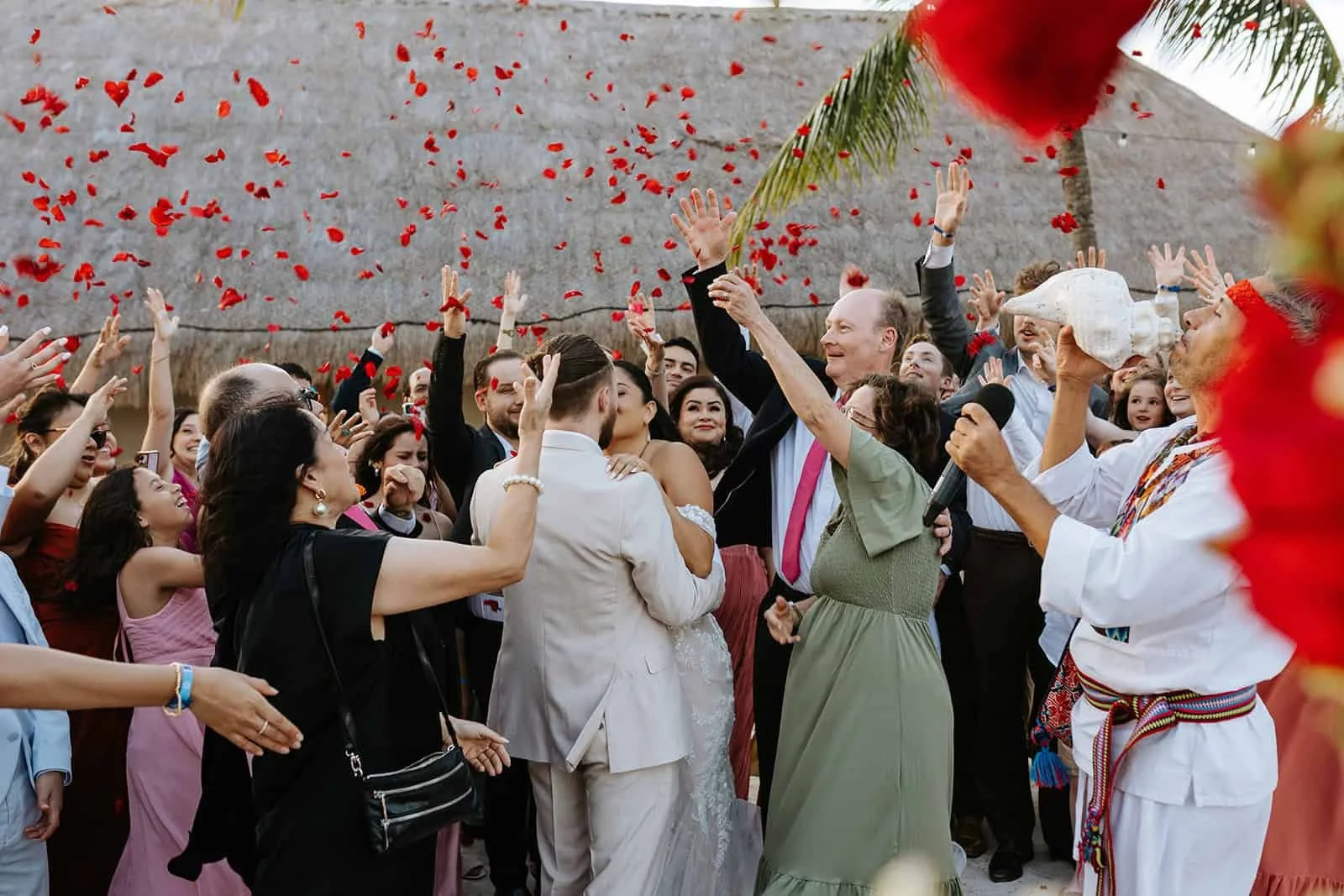 red-petal-shower-mayan-wedding-ceremony-blue-venado-riviera-maya.jpg
