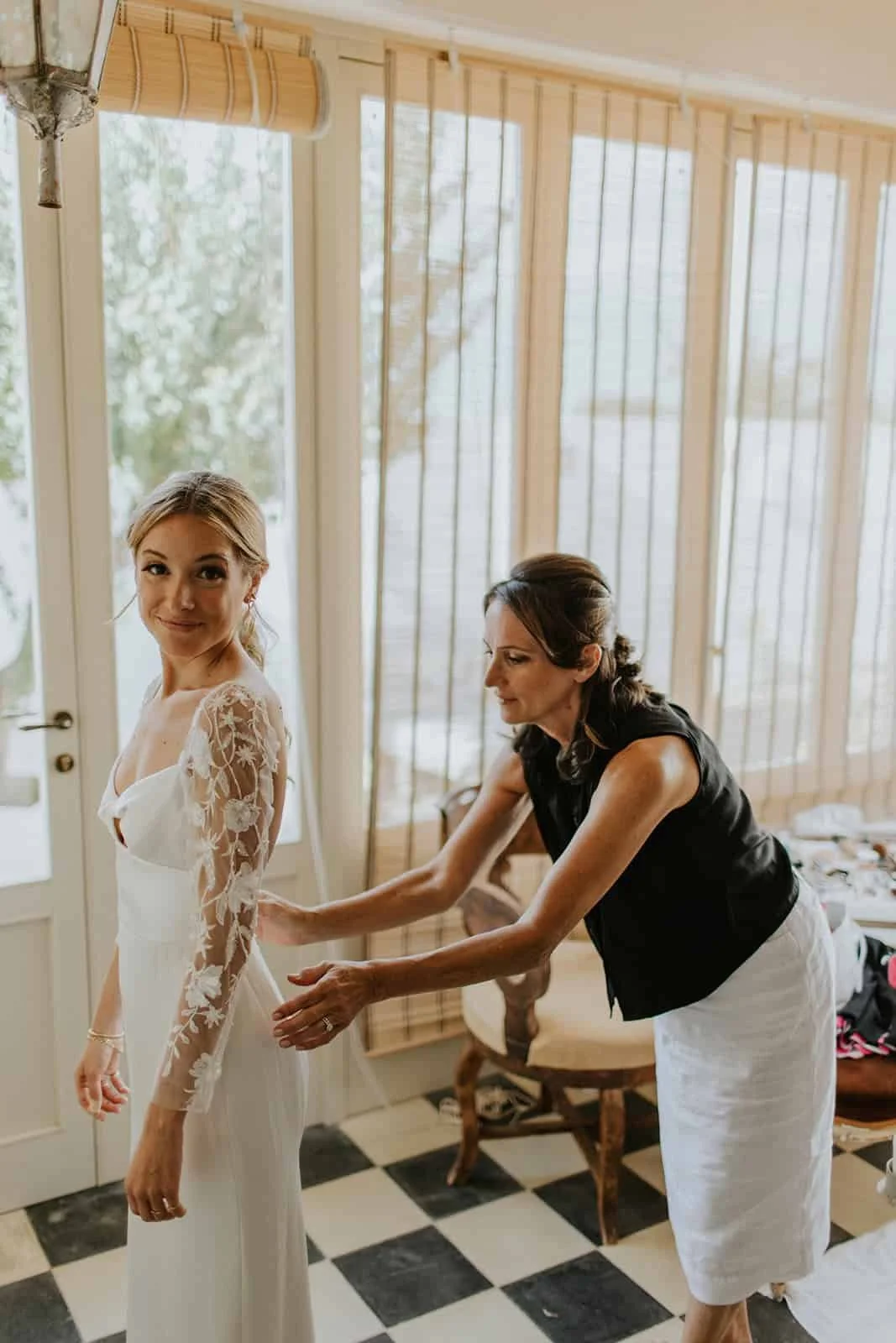 Getting into the dress at Masseria Potenti