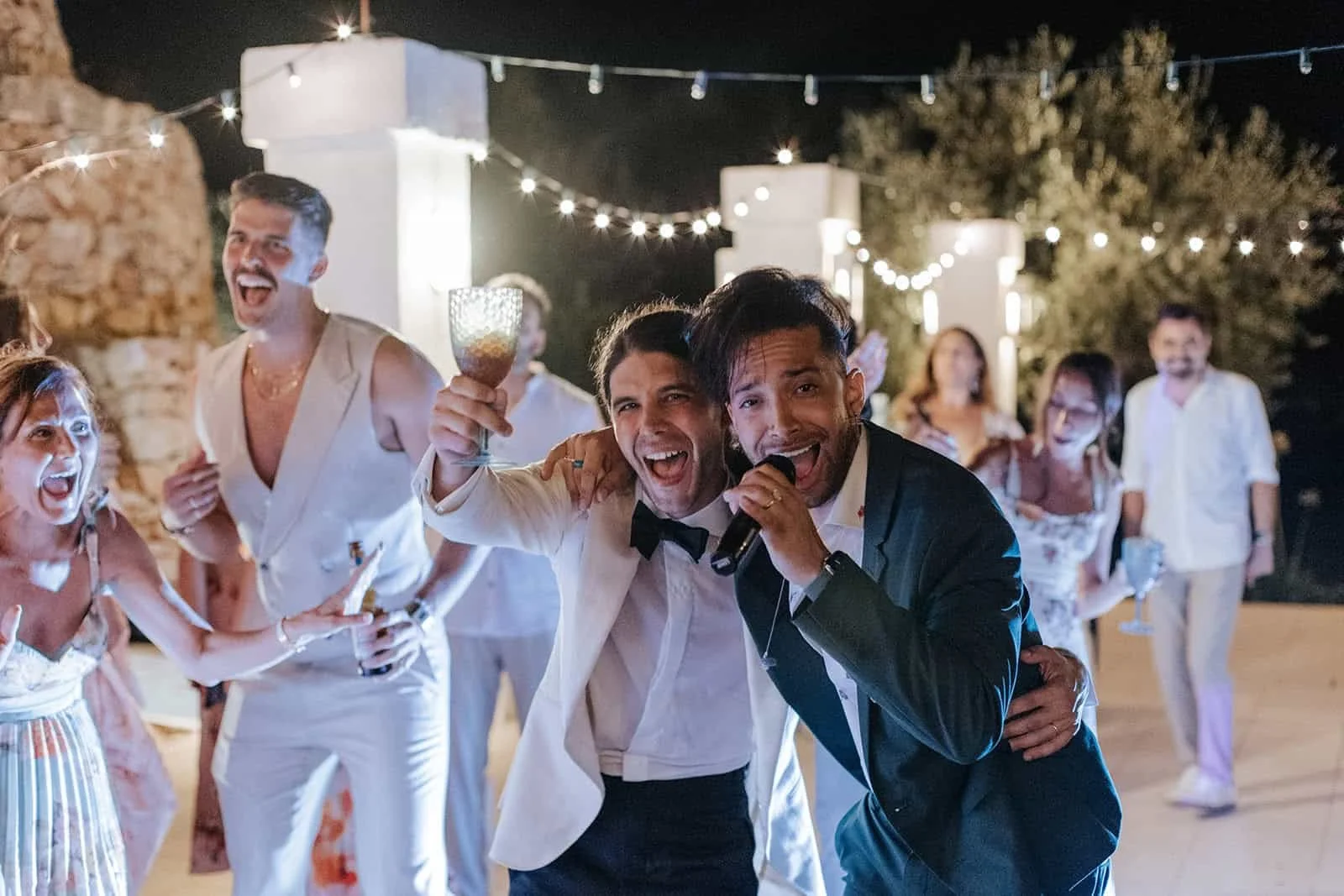 Groom Singing Along to Live Band Performance