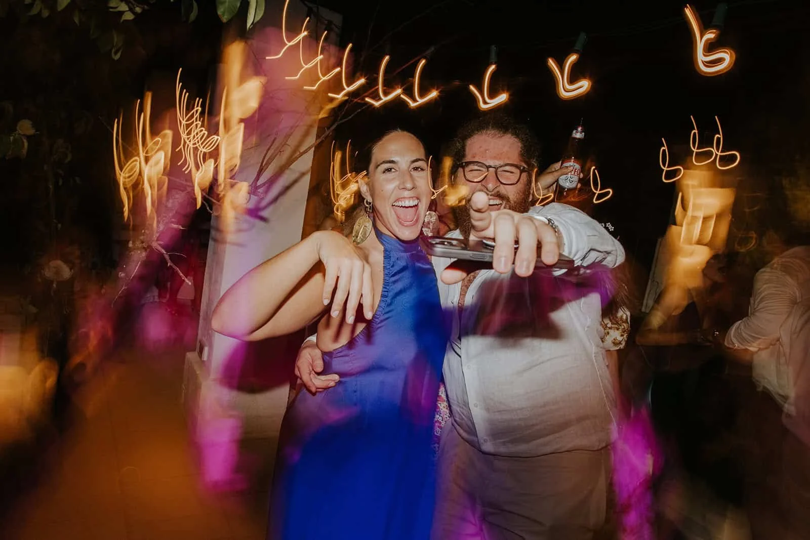 Couple Celebrating Together on Dance Floor