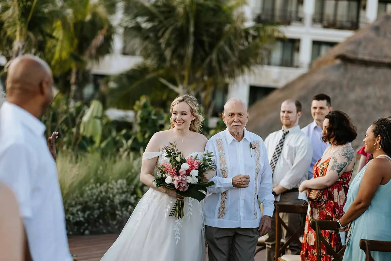 The Bride Walks the Aisle with Her Father