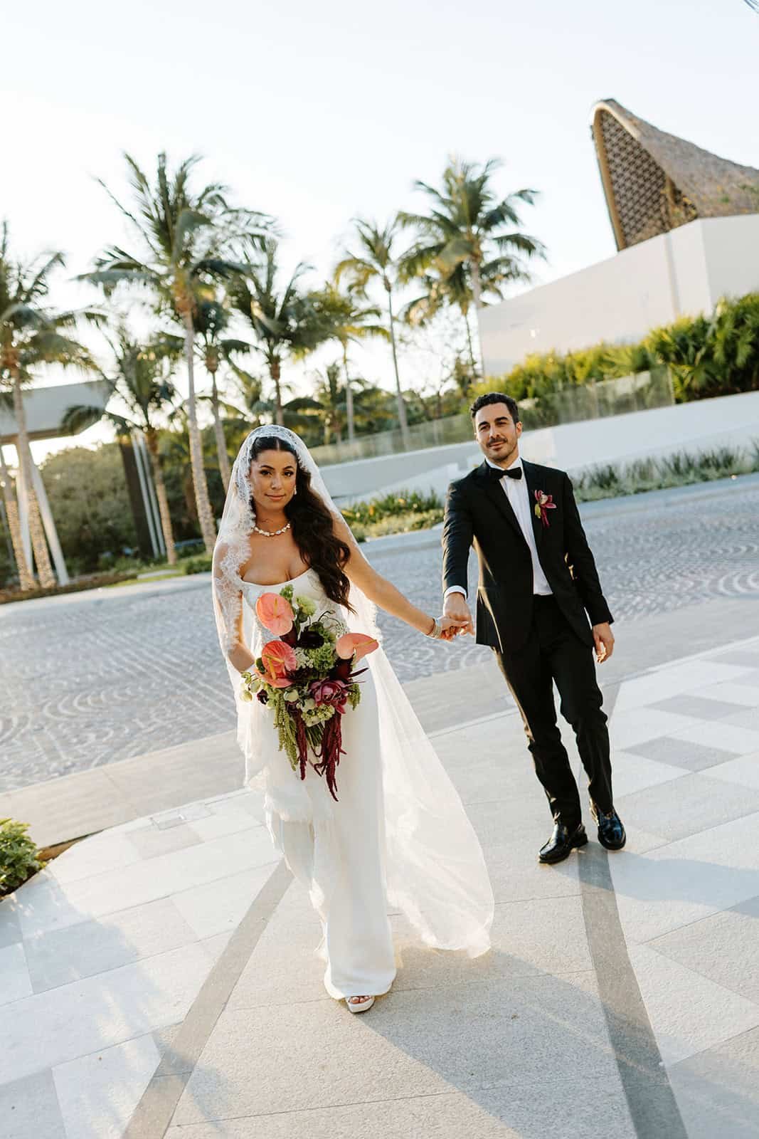 tierraluna-gardens-cancun-bride-groom-walking.jpg
