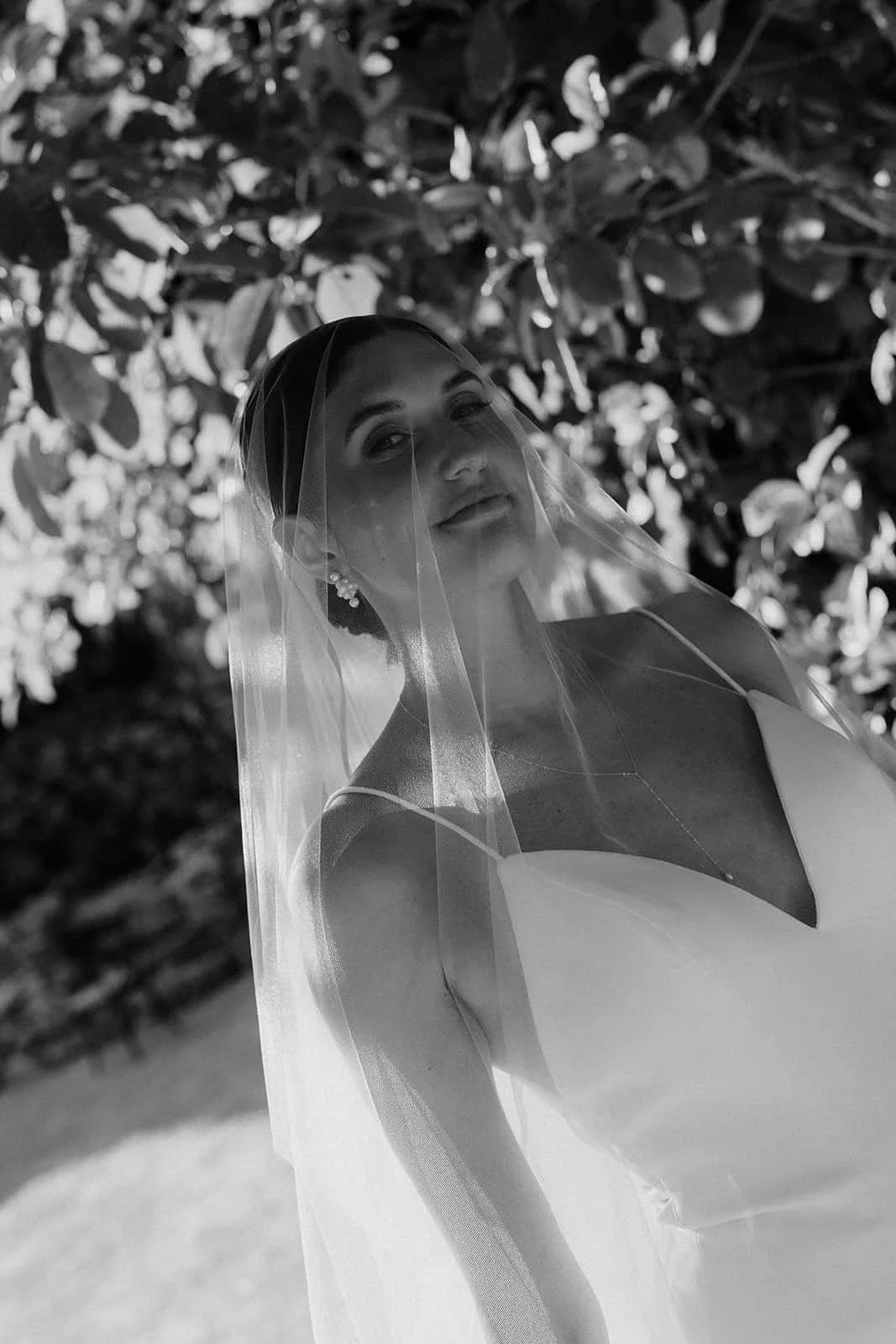Bride portrait under veil at Secrets Moxché wedding in Playa del Carmen, Mexico