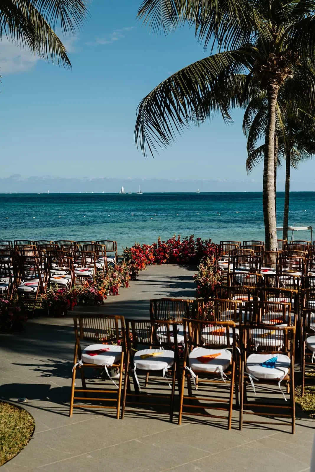 Destination wedding ceremony setup at Garza Blanca Cancun overlooking the ocean