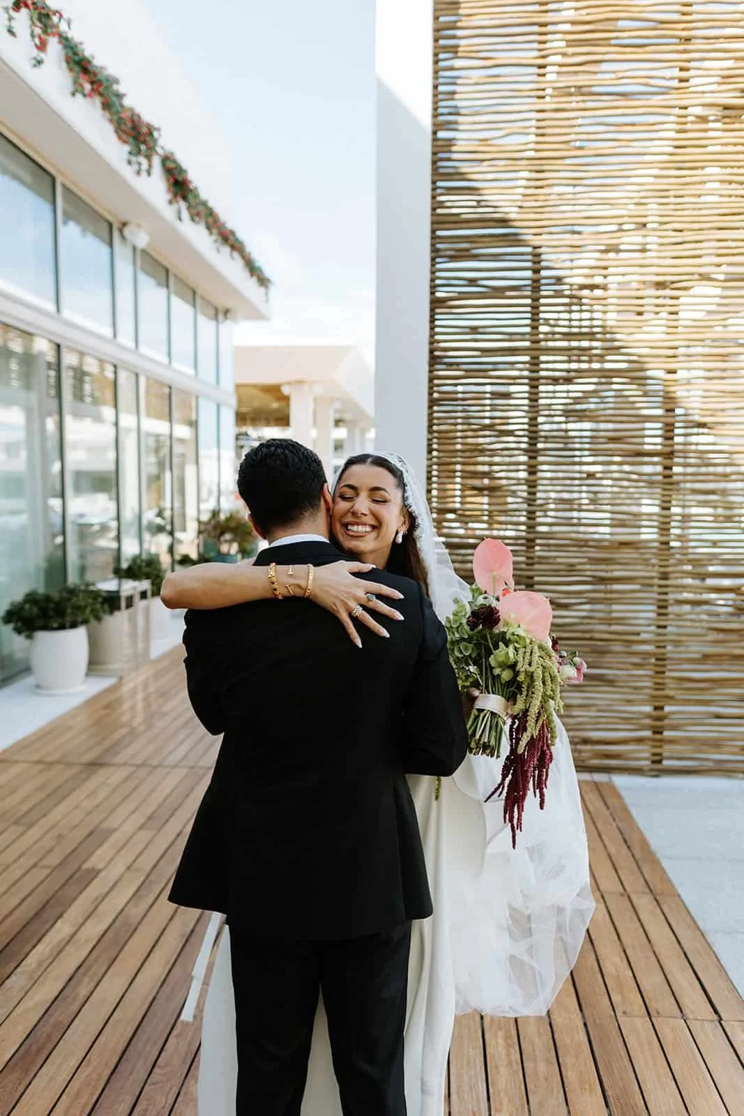 garza-blanca-cancun-wedding-couple-walkway- 1st-look.jpg