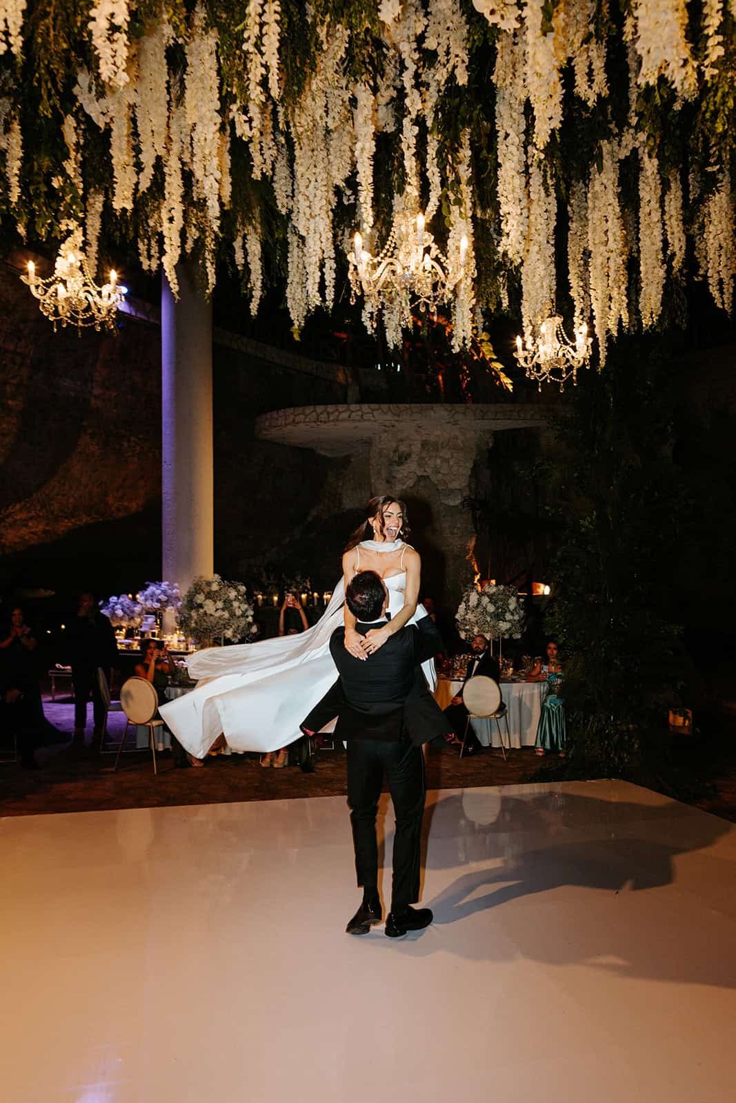 xcaret-park-wedding-first-dance-lift.jpg