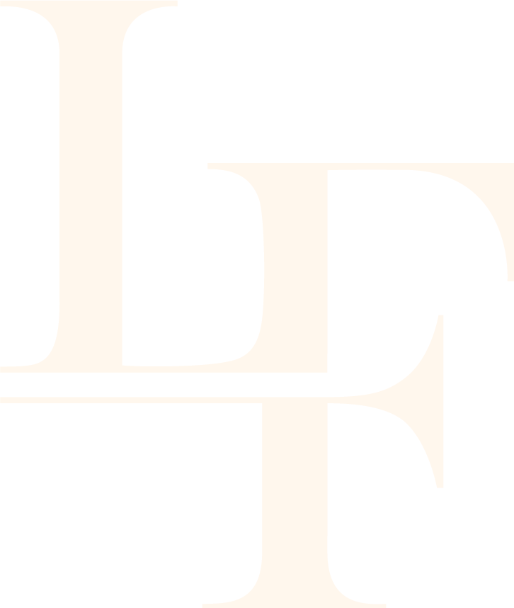 Close-up of a black and white logo with stylized lettering.