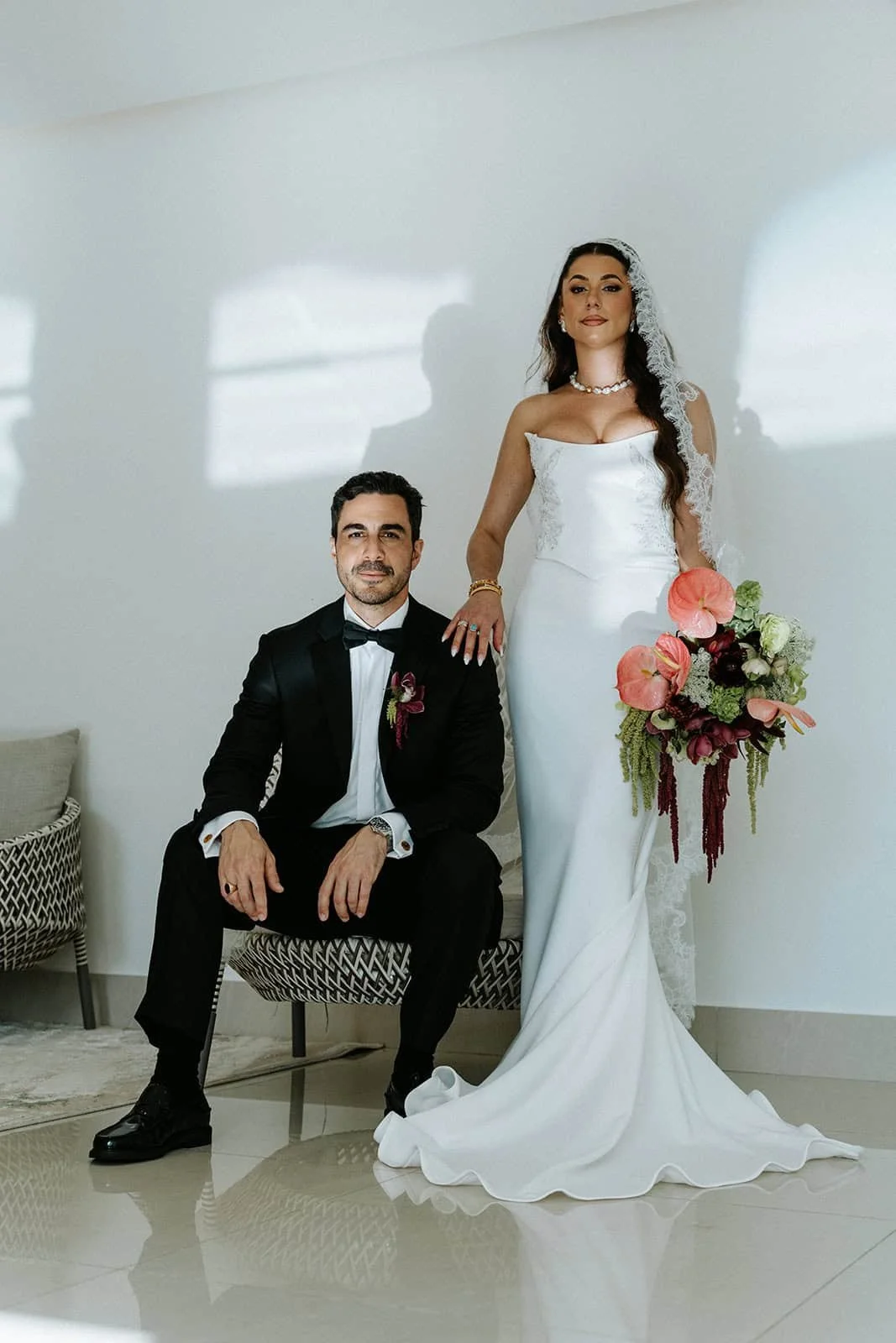 garza-blanca-cancun-wedding-couple-portrait-seated.jpg