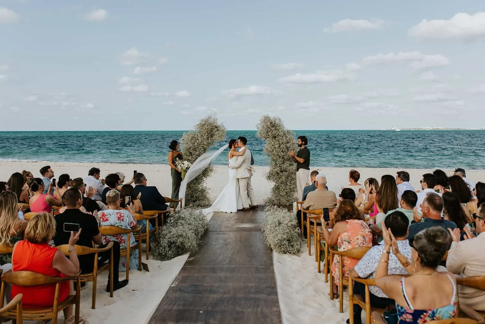Destination wedding ceremony at Finest Playa Mujeres beach in Cancun Mexico