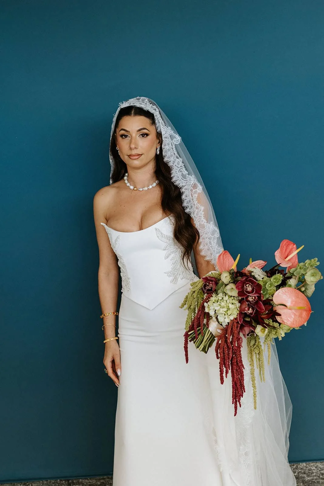 garza-blanca-cancun-bride-portrait-bouquet.jpg