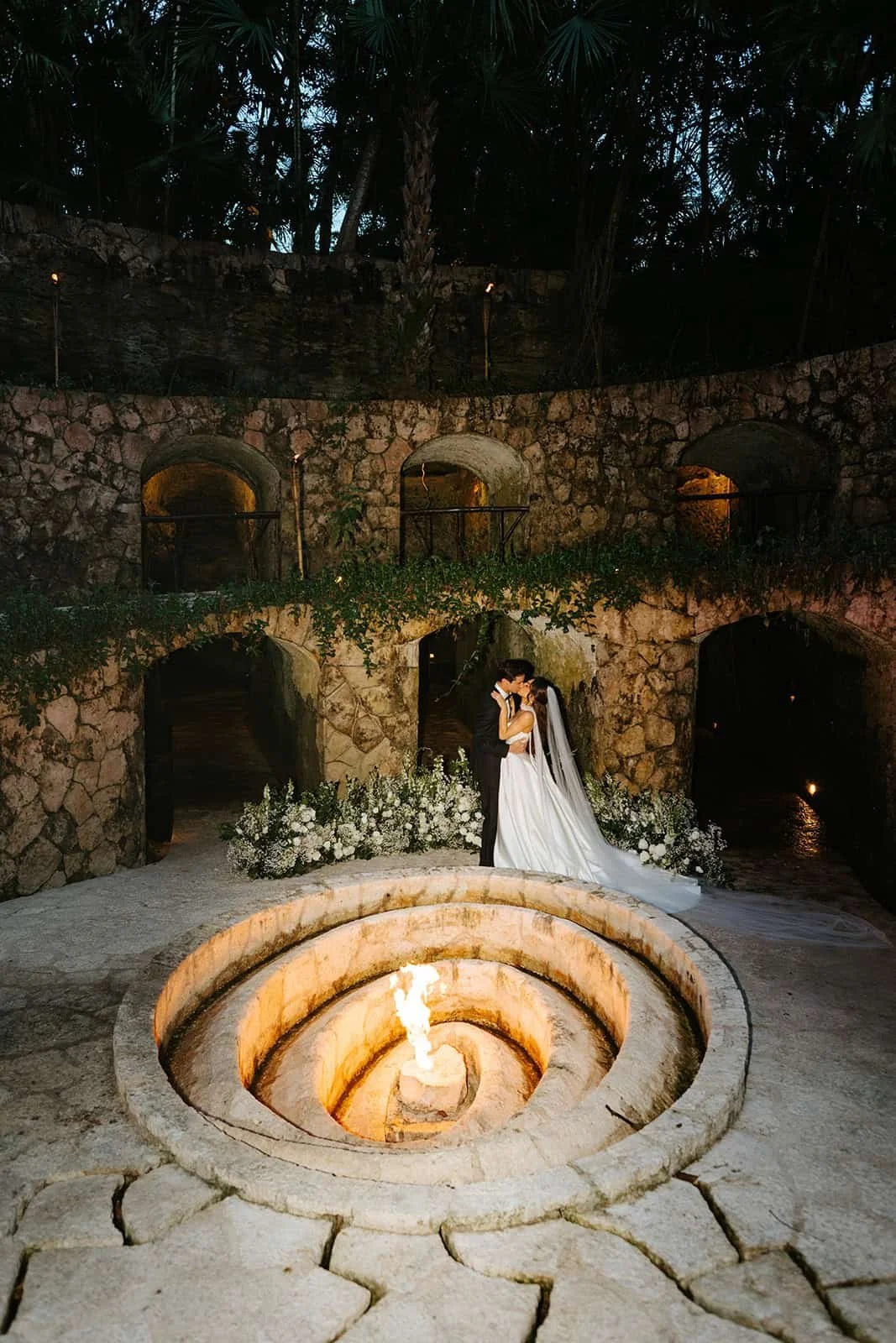 caracol-xcaret-park-wedding-first-kiss-night.jpg