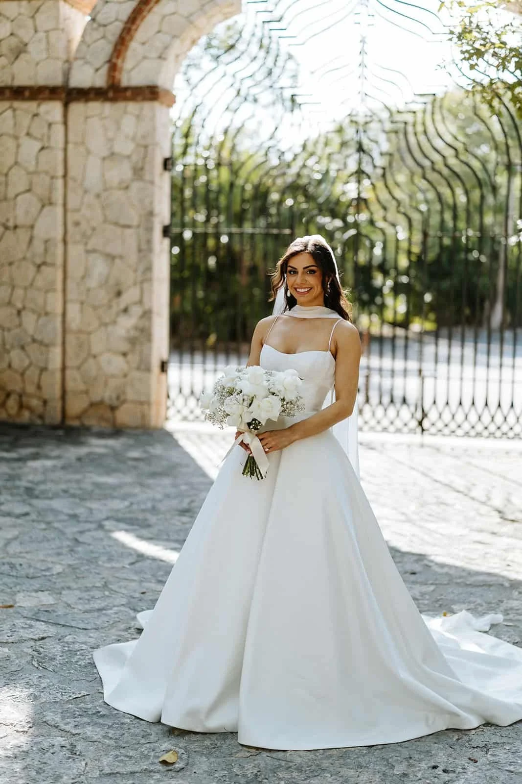 xcaret-park-bride-portrait-stone-arch.jpg
