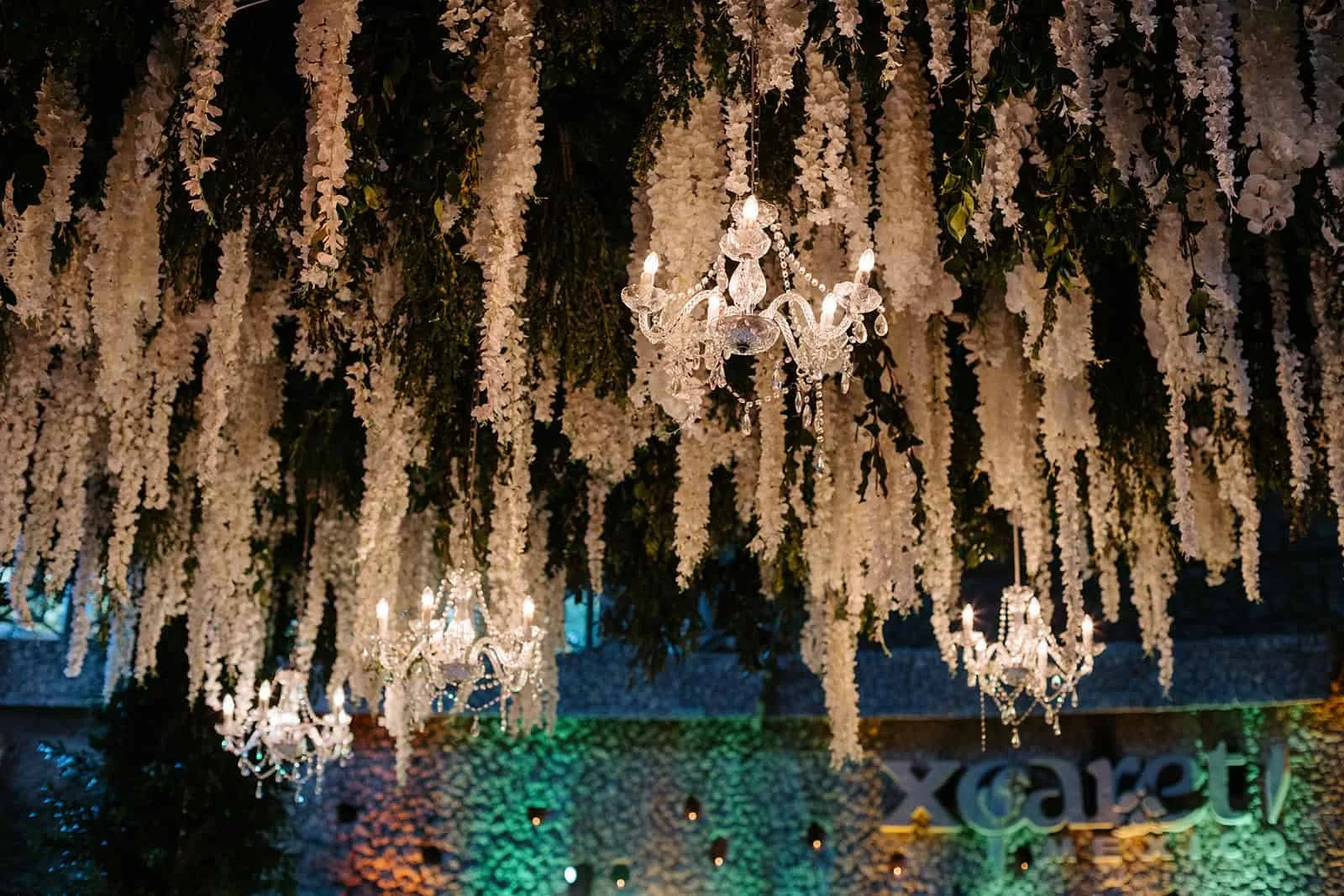 xcaret-park-wedding-reception-floral-chandeliers.jpg