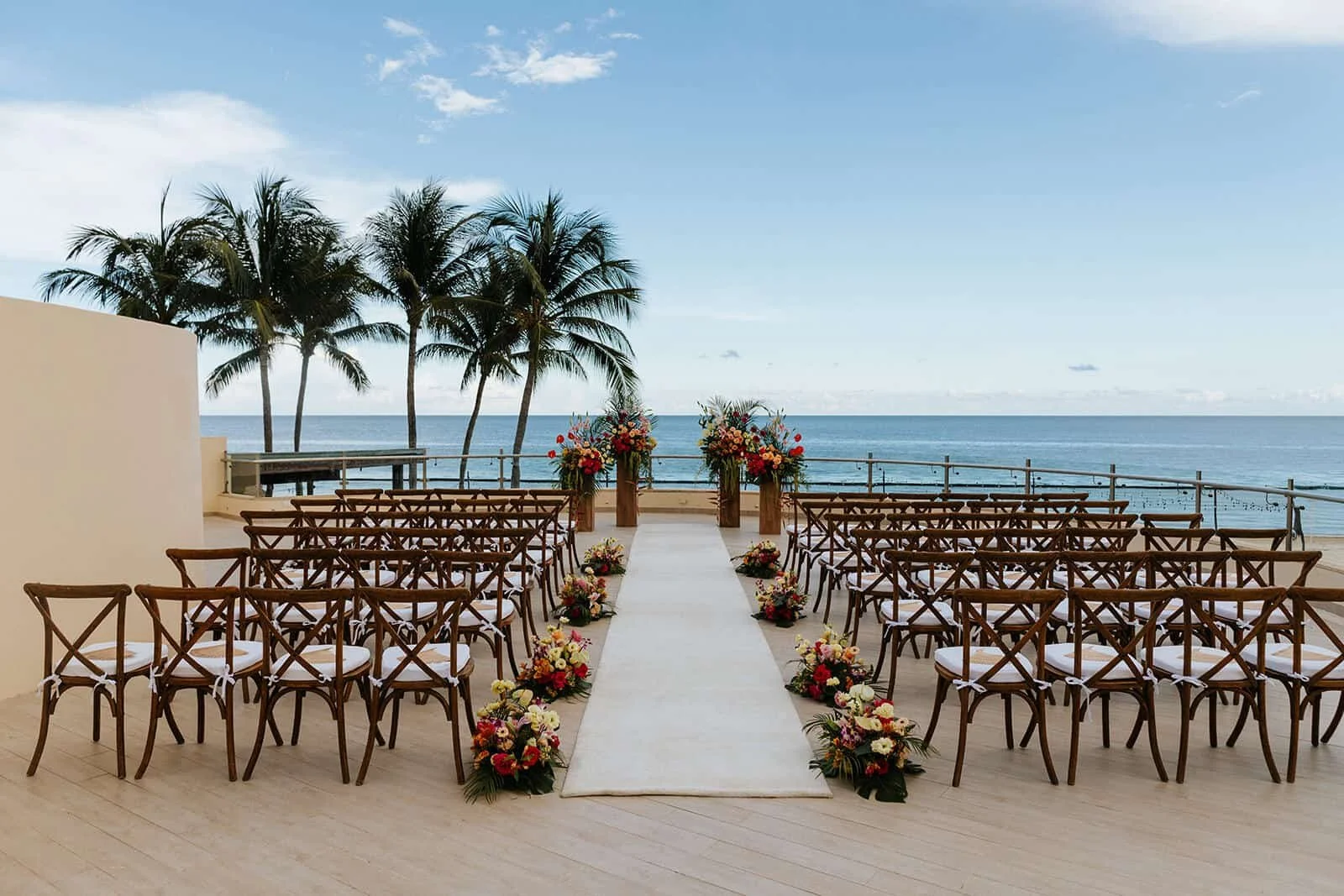 Ocean view wedding ceremony setup at a luxury Cancun wedding resort