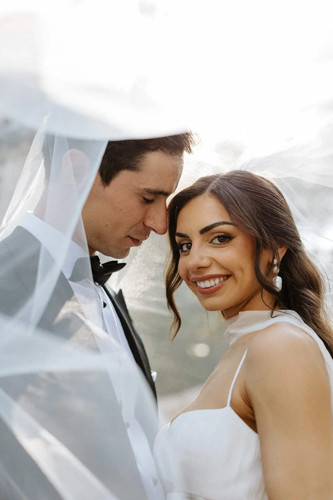 xcaret-park-wedding-couple-under-veil.jpg