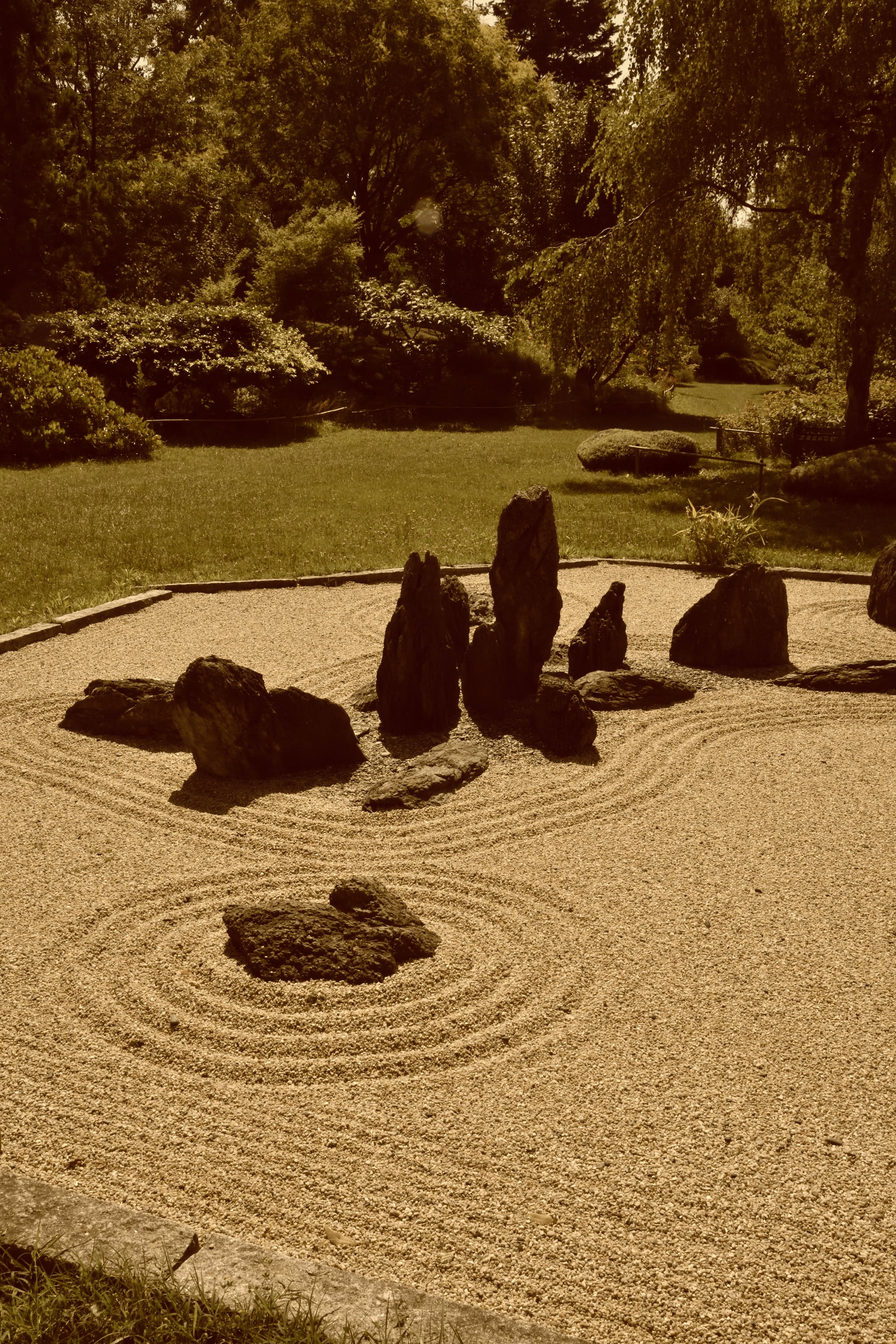 Raked Zen garden symbolising stillness and focus — representing the Calm Abiding meditation course offered by One Breath Meditation on the South Coast of NSW and online.