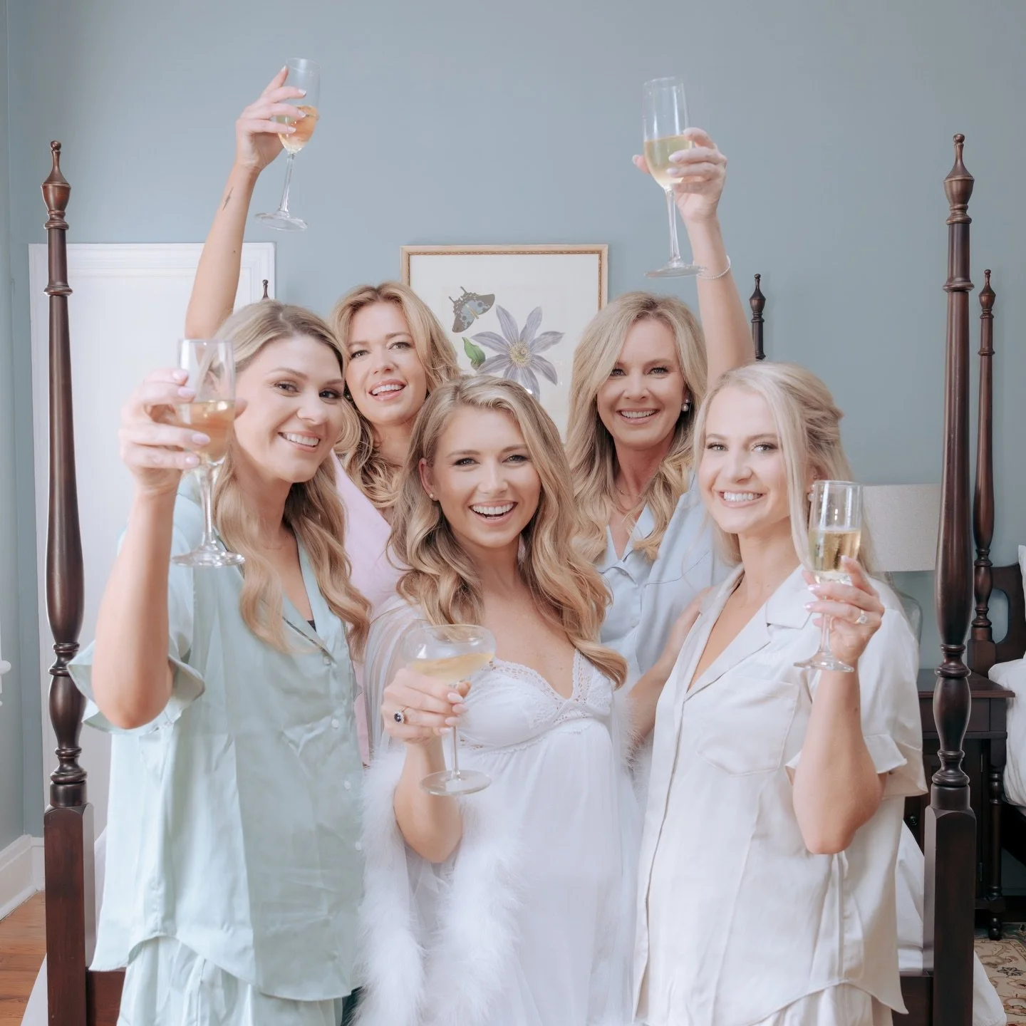 The morning unfolded in silky textures and thoughtful details - her grandmother&rsquo;s name stitched into heirloom silk, the gentle rhythm of hands in hair, dresses swaying in the quiet movement of it all, and L&rsquo;s smile brightening the room lo