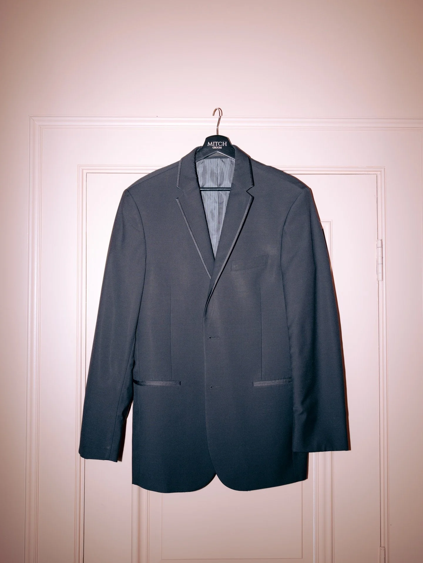 We always see the dress hanging in the window light but the suit jacket carries just as much anticipation. Pressed and waiting, holding the shape of the person  who will step into it and promise forever. The quiet details of the morning matter for ev