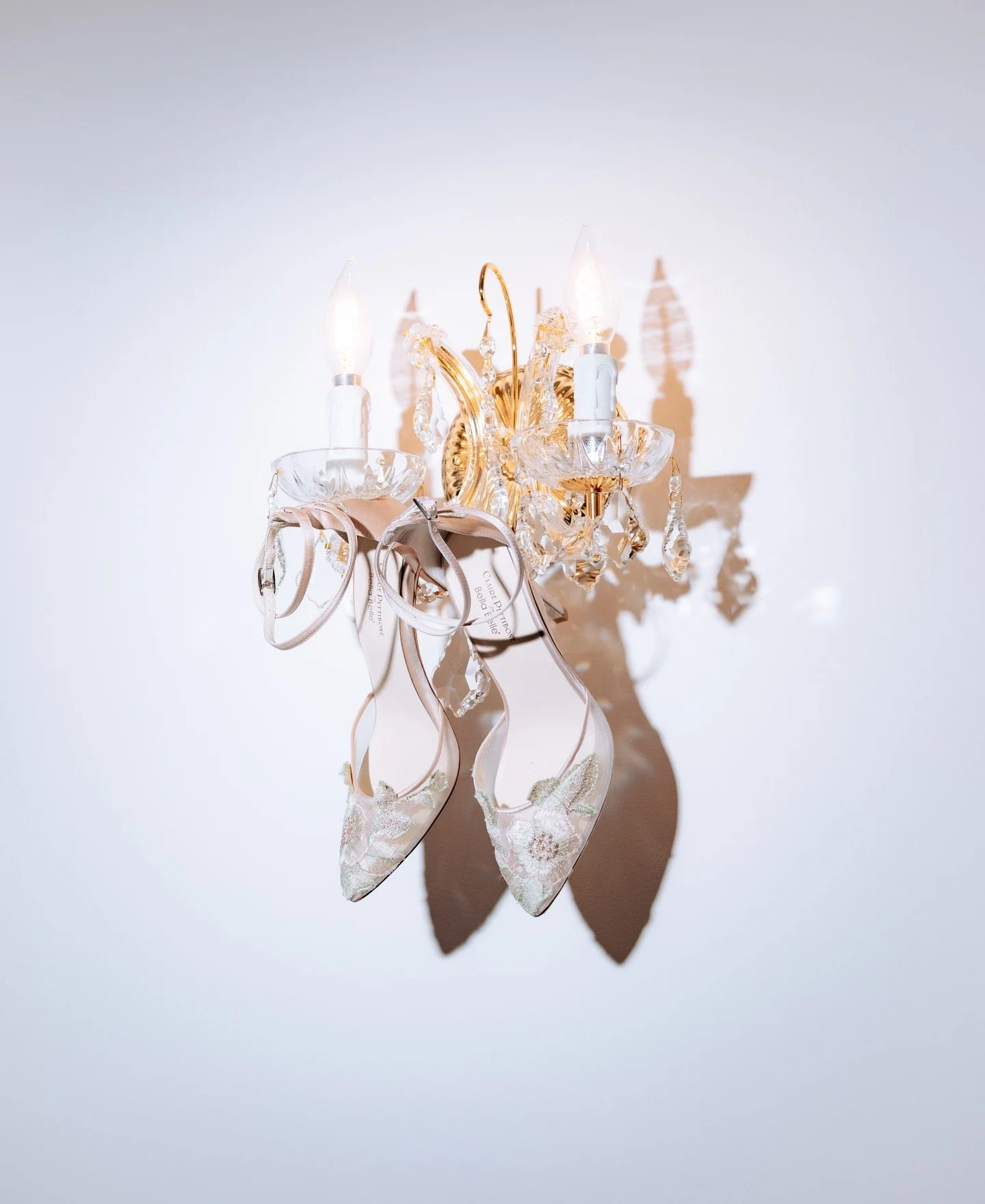 From the heirloom details to the quiet confidence in her gaze, every element was chosen with intention. The embroidered heels, the Parisian notes, the sculpted silhouette of her gown - all part of a story that feels both timeless and entirely her own