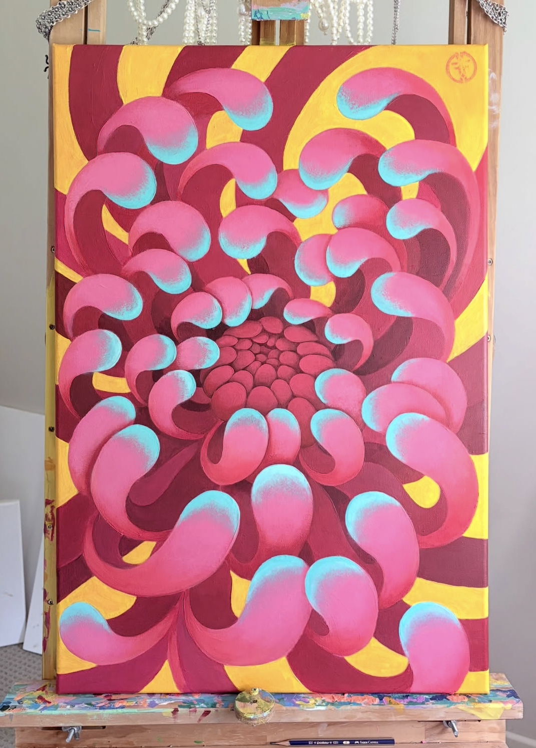 Abstract painting featuring pink and blue bubble-like shapes with a yellow background.
