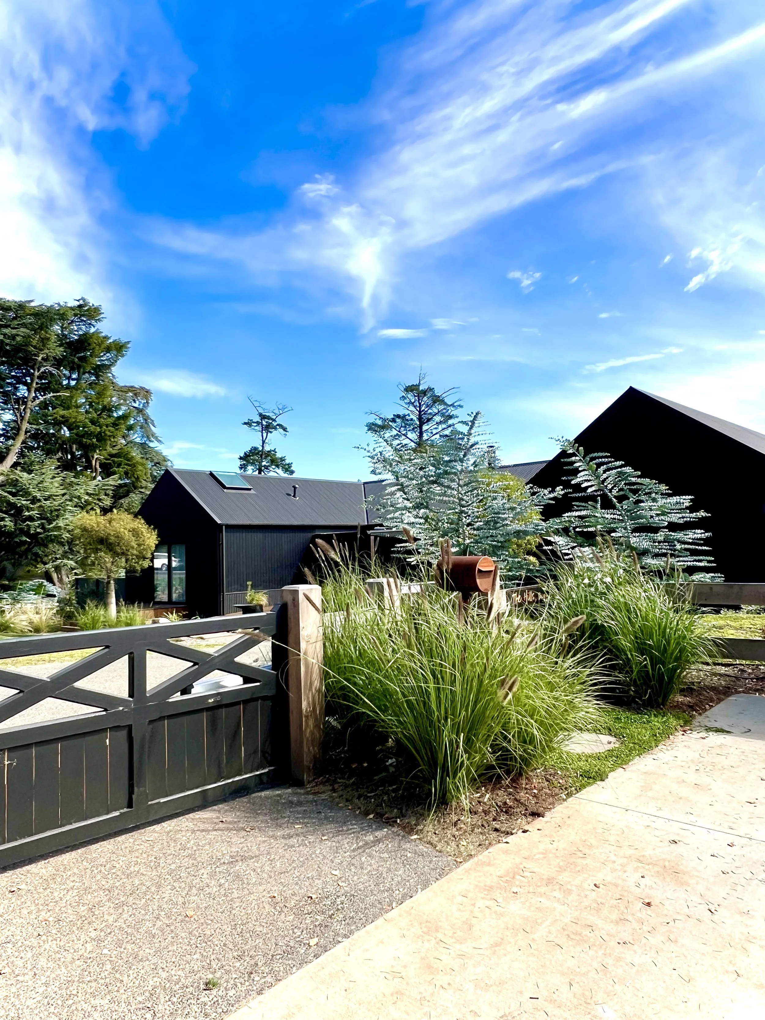 The Block Daylesford garden by Colin Hyett Design with sculptural native planting, natural stone and Australian barn architecture.