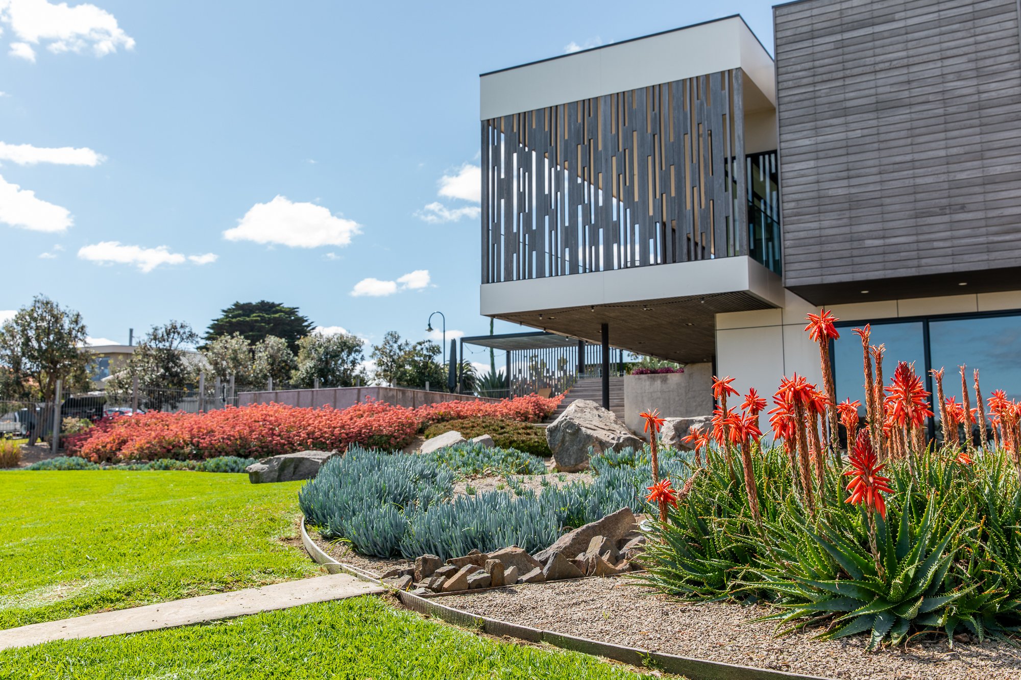Edgar Place is a sculptural and contemporary garden designed to complement the home's modern architecture while thriving in the peninsula’s climate.