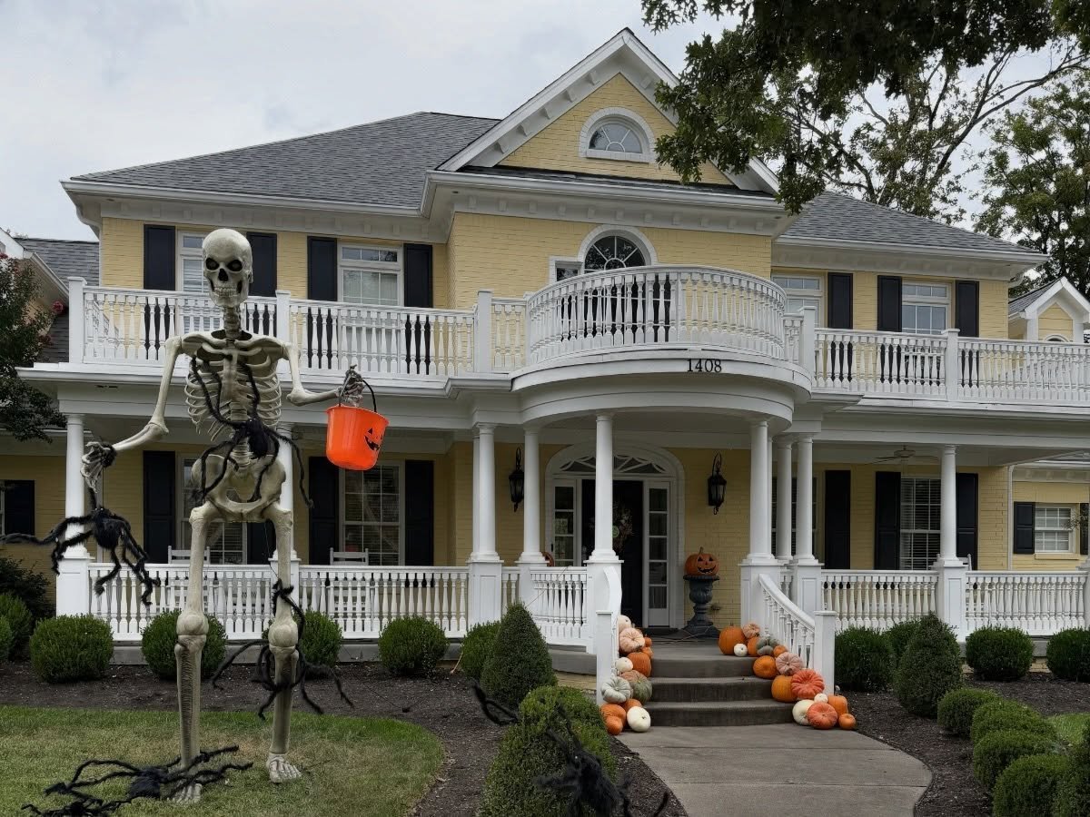 Love how the orange from and pumpkins tie into the candy bucket of the giant skeleton ☠️💀

Hello Pumpkin styled the steps of this Halloween ready home in Louisville, Kentucky with a Pretty Porch Package. At a date of the customers choosing, we will 