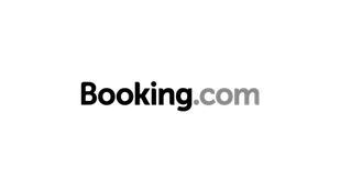 Close-up of a black and white skateboard wheel with a logo.