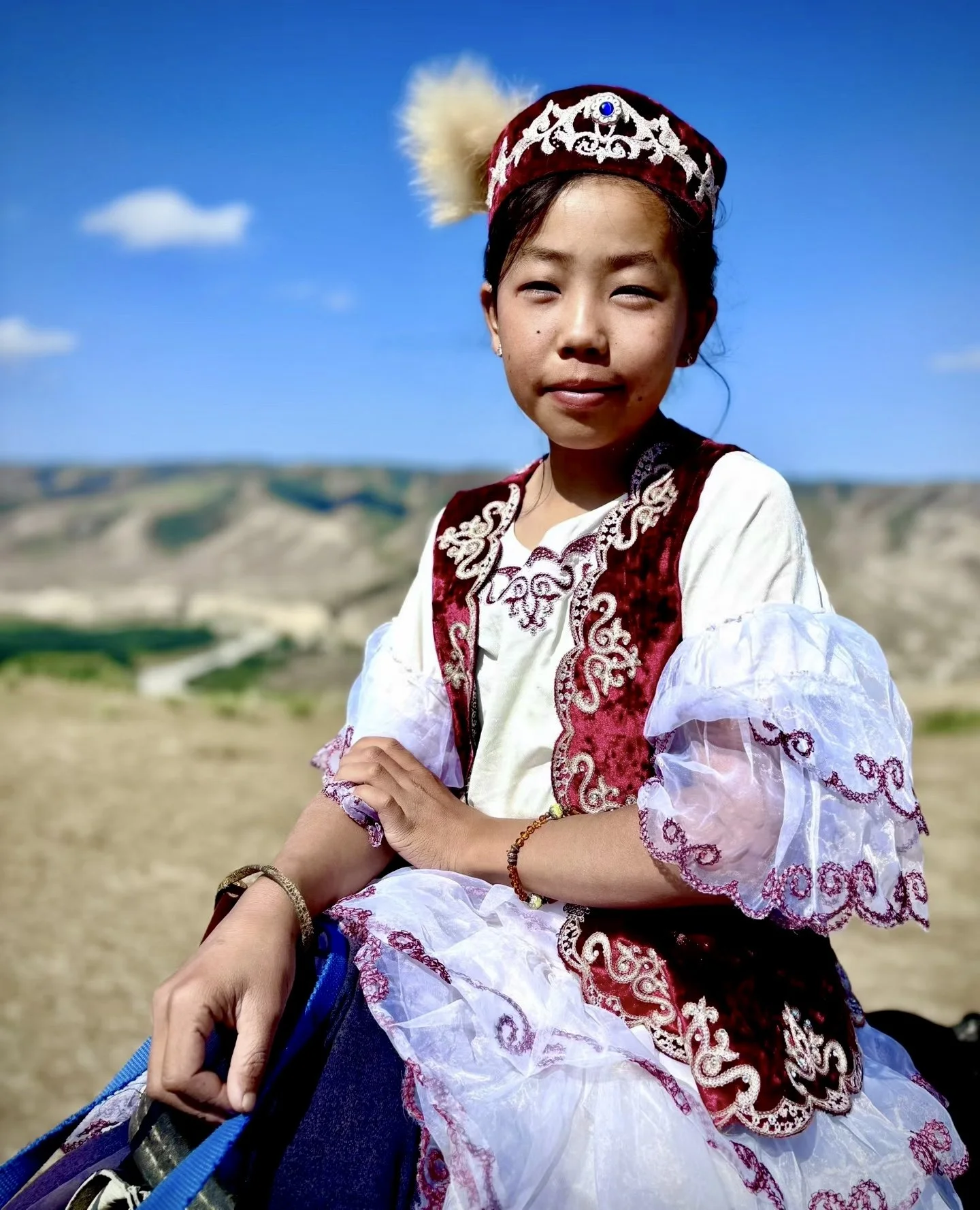 Uyghur girl on horse, photography by Milimo Zumbunu