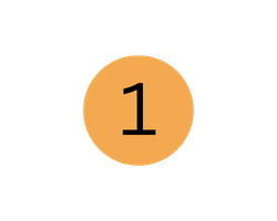 Close-up of a metallic surface with a circular orange commemorative coin featuring the number 1 in black in the center.