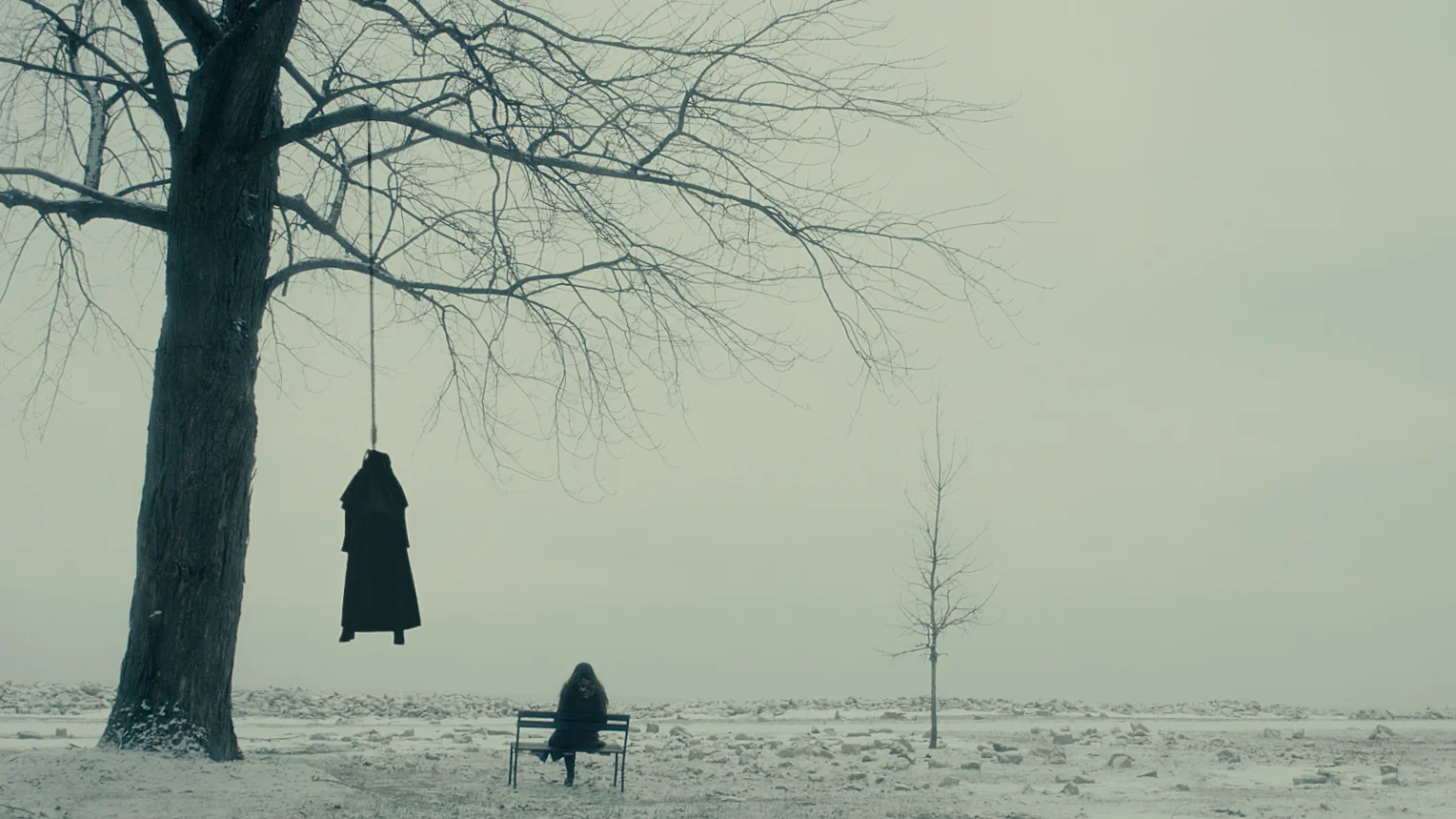 The Book of Birdie - Hanging nun in snow scene