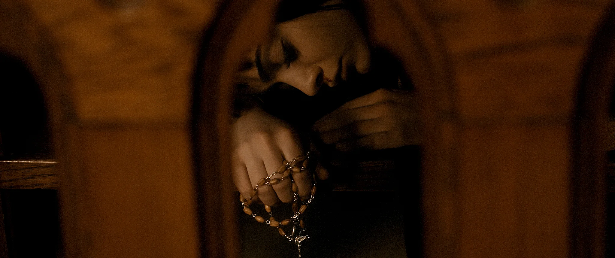 The Book of Birdie - Birdie sleeping with rosary