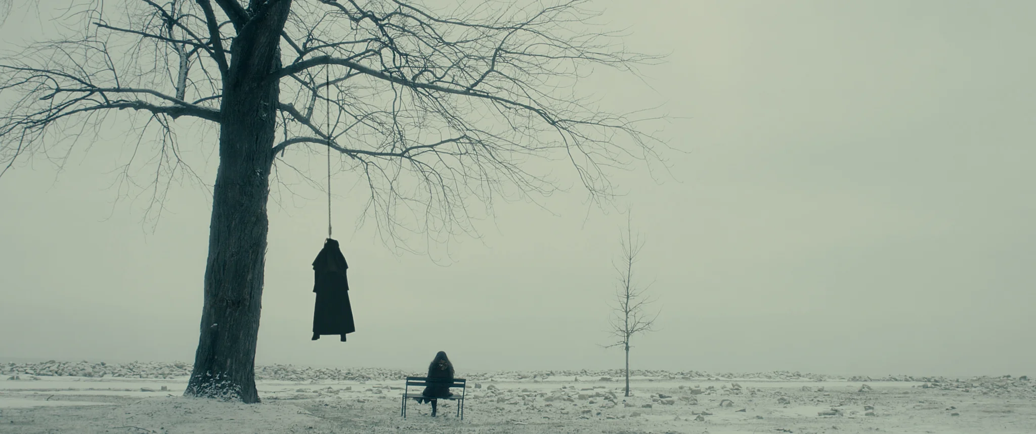 The Book of Birdie - Hanging nun in snow scene