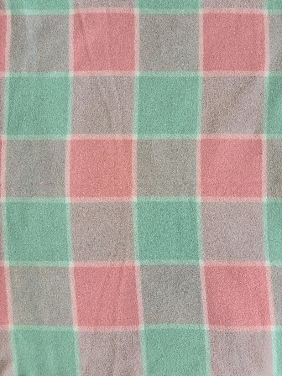 Pink coloured vintage pure wool blanket