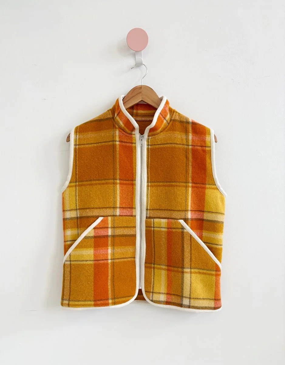 orange coloured vest made from a repurposed 100% pure Australian wool blanket
