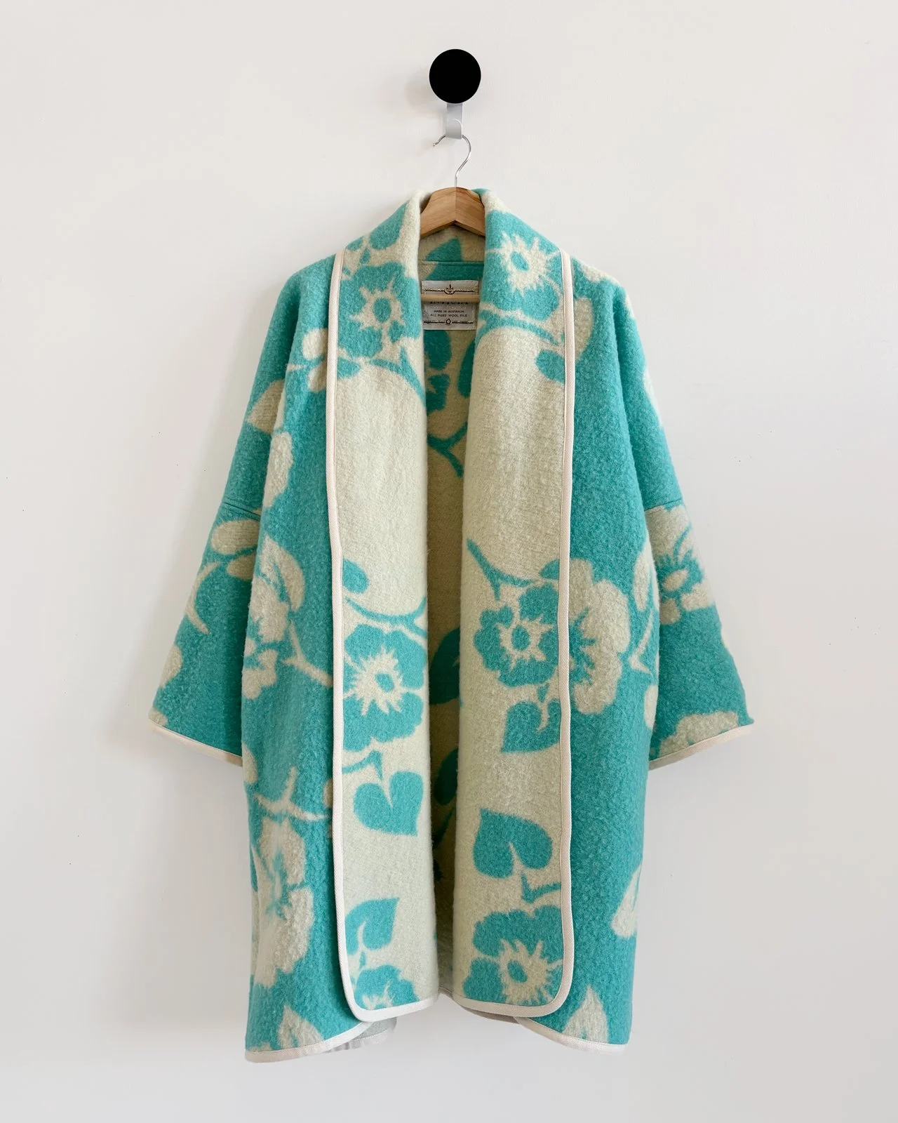 Ameera-jacket-front-hanging-post.jpg