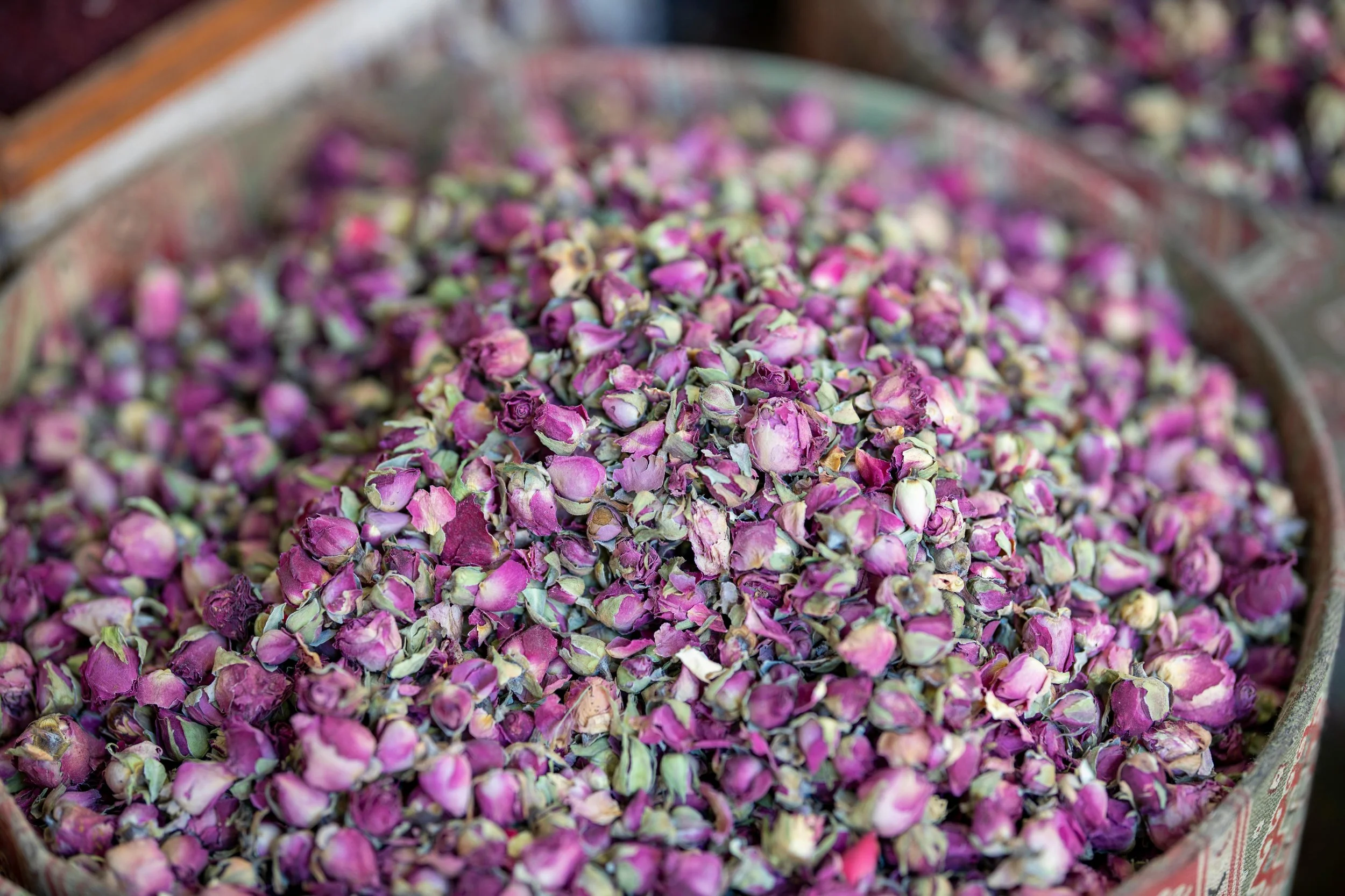 a big bowl of dried rose buds