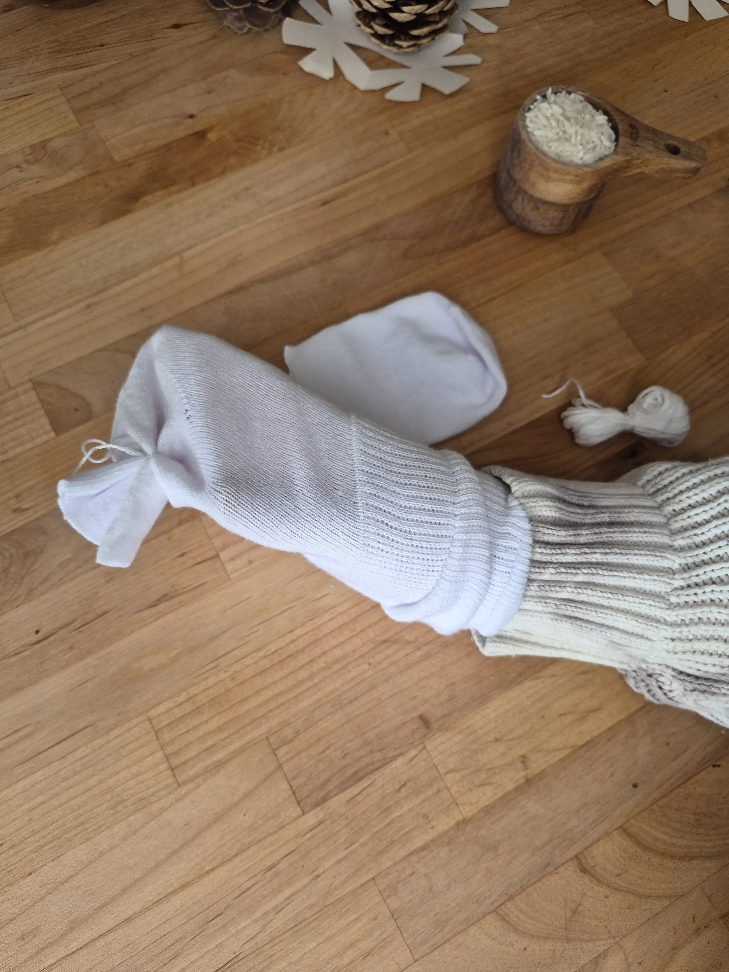 Turn the sock so the tied end is inside.