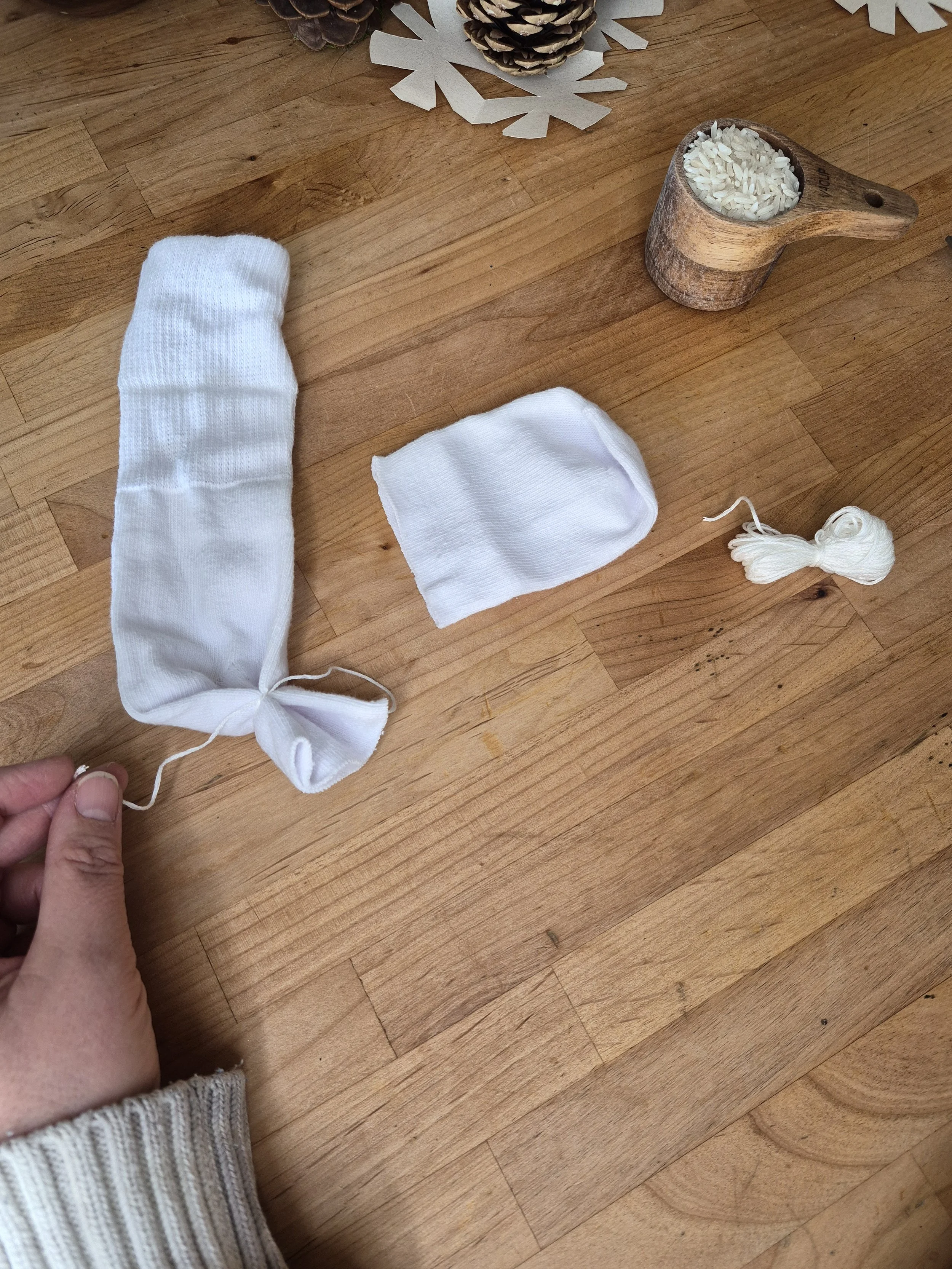 Securely tie the end of the sock shut. 