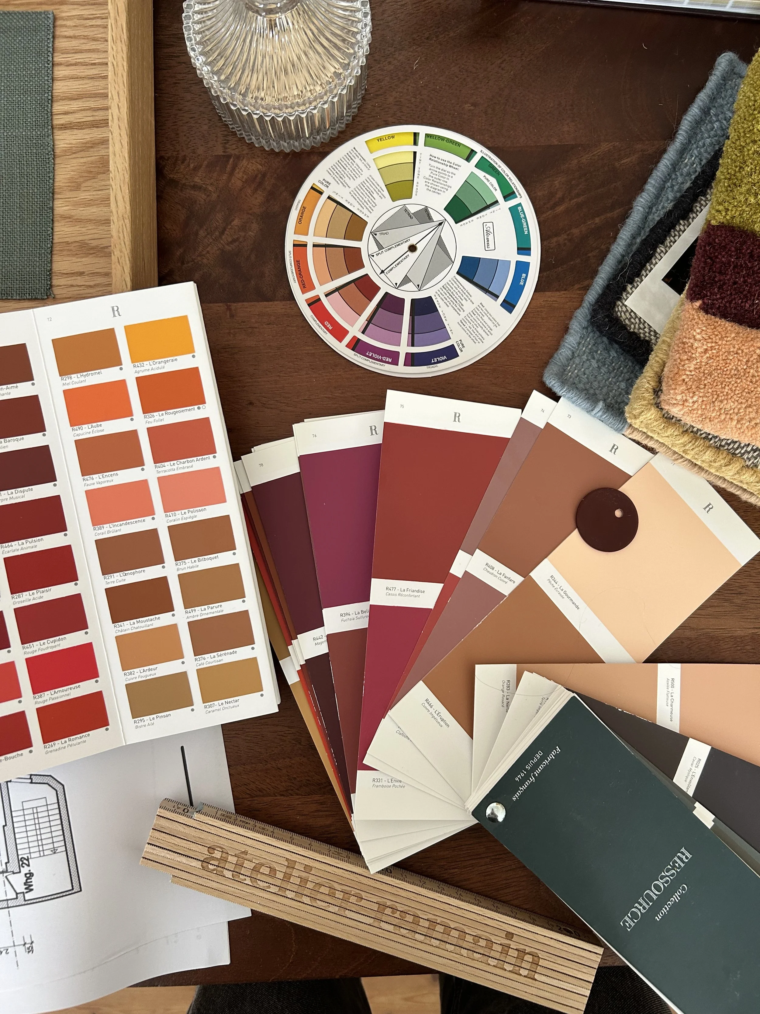 Colour wheel with colour swatches on a table